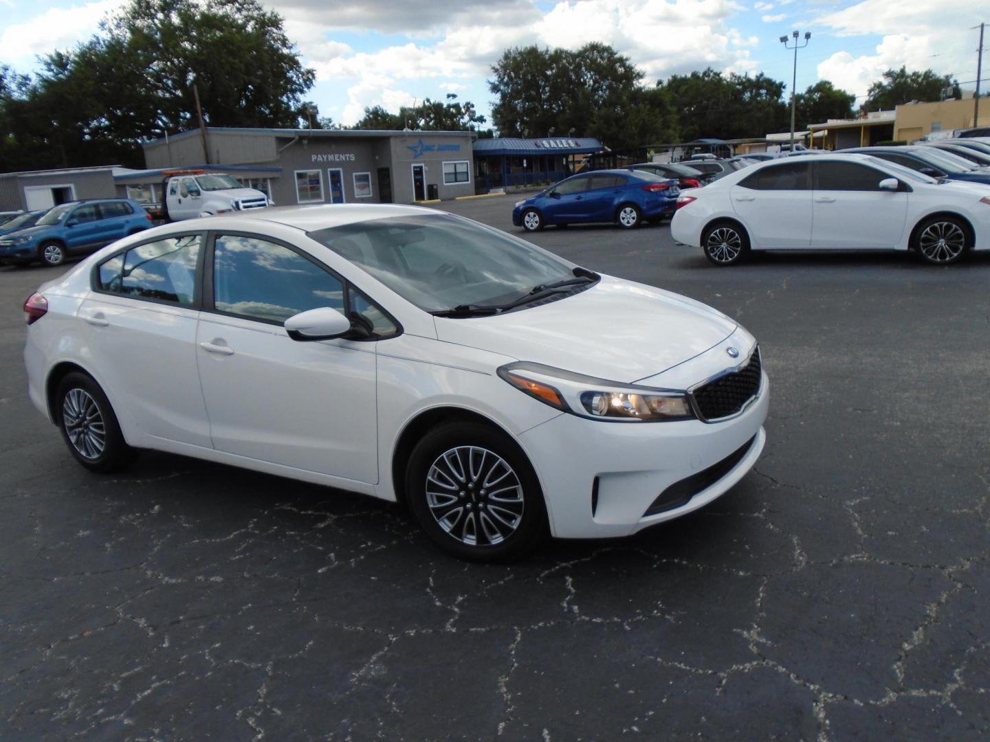 2017 White /Black Kia Forte LX 6M (3KPFK4A7XHE) with an 2.0L L4 DOHC 16V engine, 6M transmission, located at 6112 N Florida Avenue, Tampa, FL, 33604, (888) 521-5131, 27.954929, -82.459534 - 499 DOWN PLUS TAX & TAG - Photo#1
