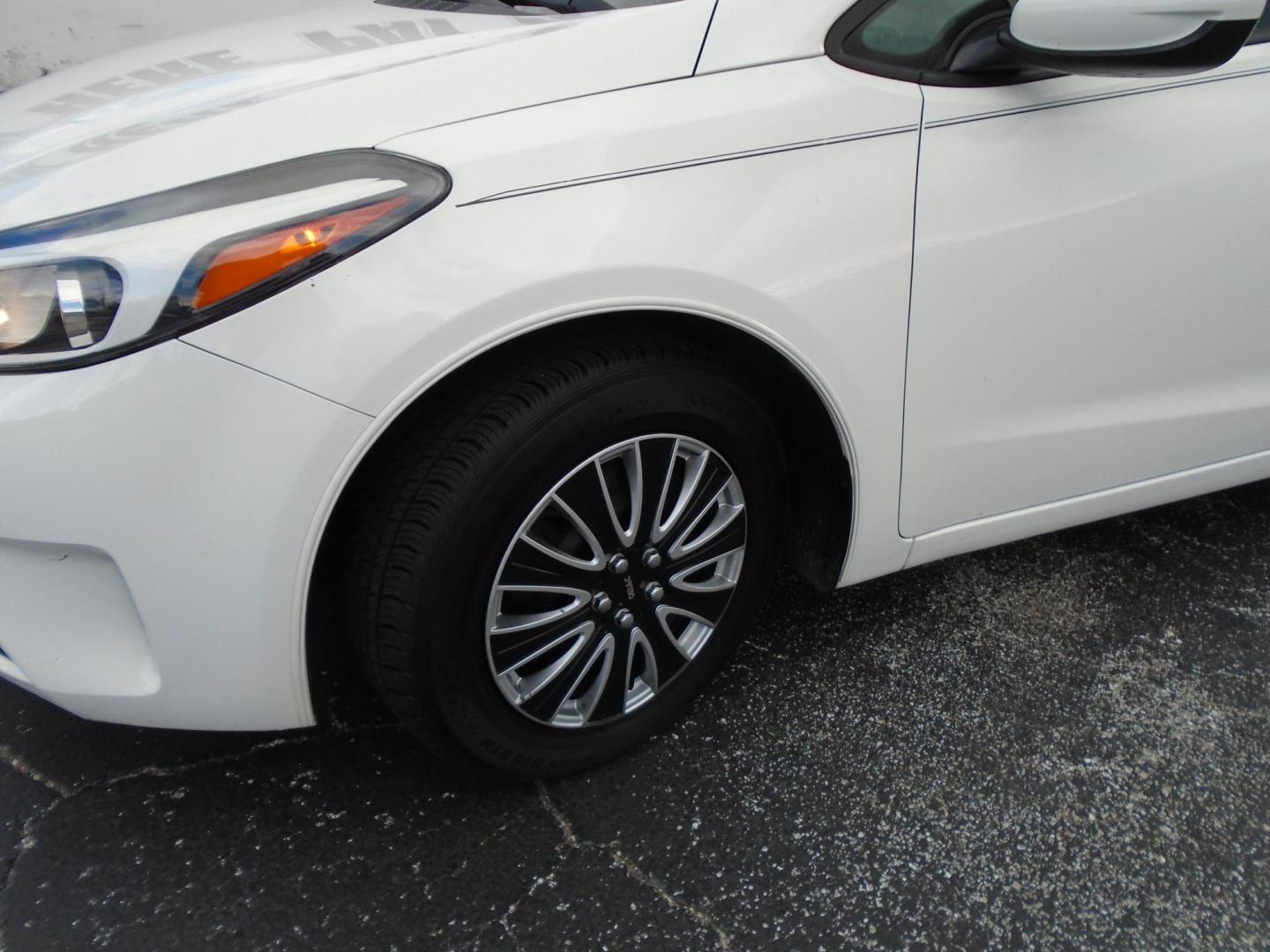 2017 White /Black Kia Forte LX 6M (3KPFK4A7XHE) with an 2.0L L4 DOHC 16V engine, 6M transmission, located at 6112 N Florida Avenue, Tampa, FL, 33604, (888) 521-5131, 27.954929, -82.459534 - 499 DOWN PLUS TAX & TAG - Photo#7
