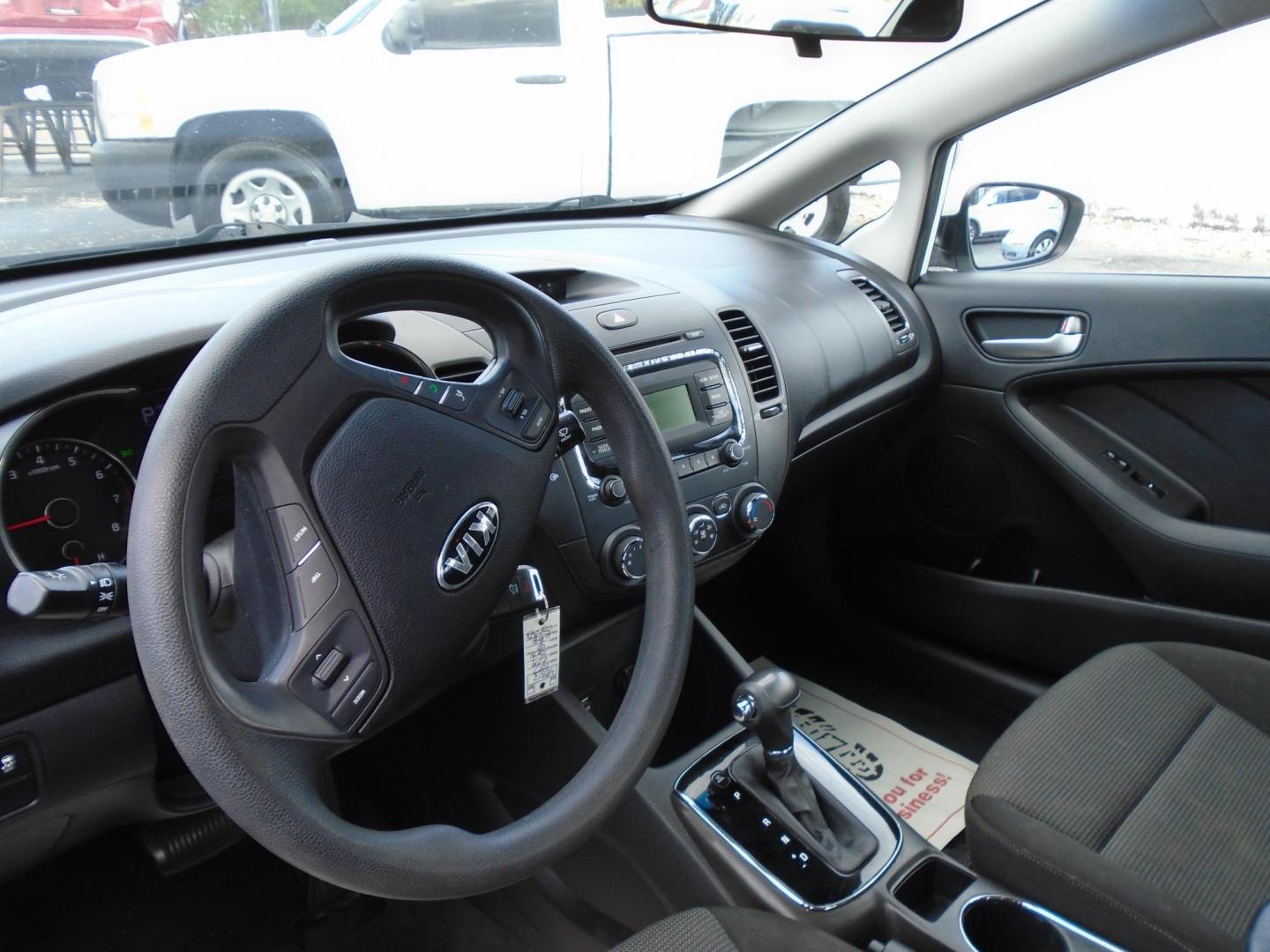 2017 White /Black Kia Forte LX 6M (3KPFK4A7XHE) with an 2.0L L4 DOHC 16V engine, 6M transmission, located at 6112 N Florida Avenue, Tampa, FL, 33604, (888) 521-5131, 27.954929, -82.459534 - 499 DOWN PLUS TAX & TAG - Photo#8