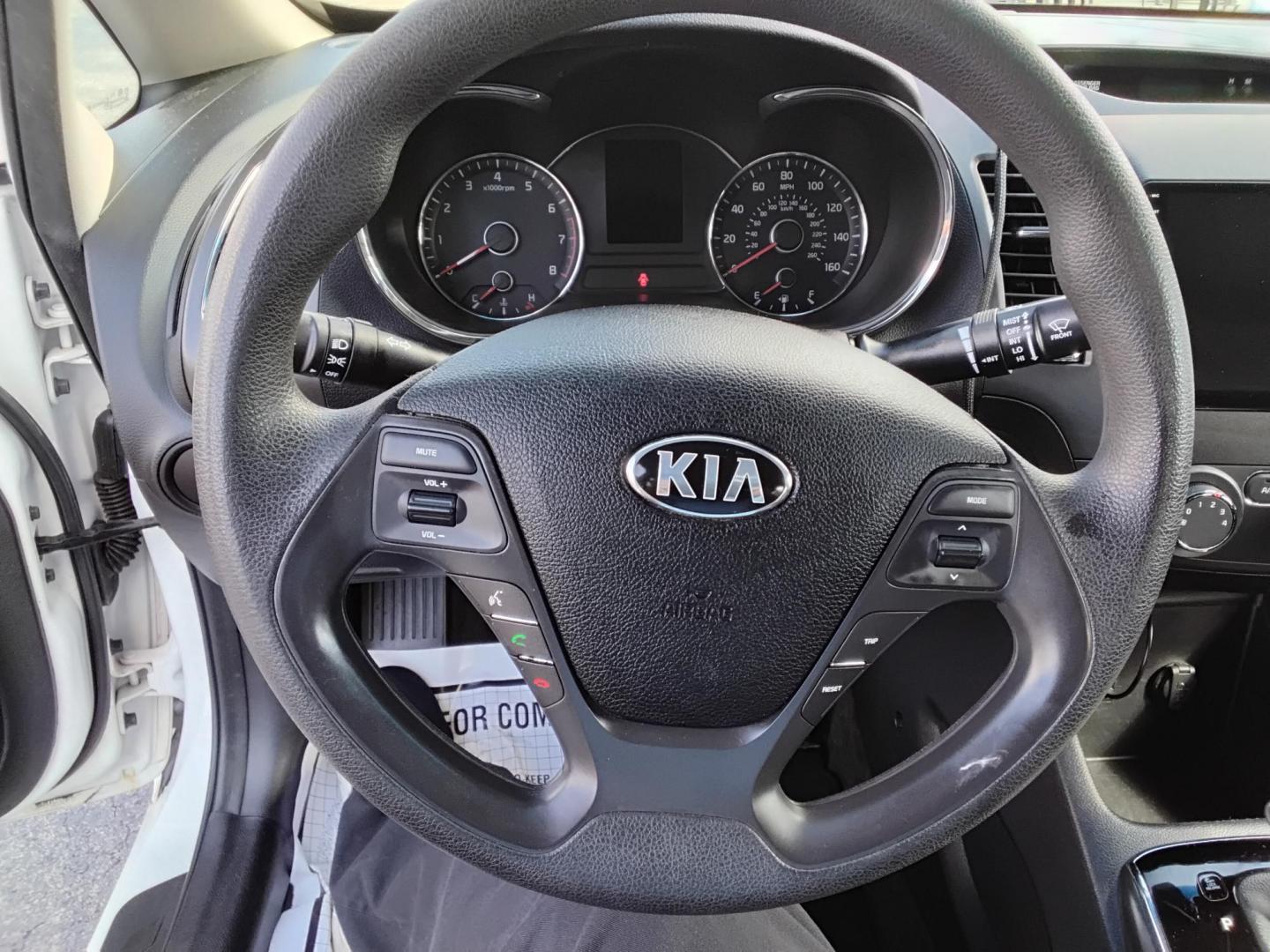 2017 White /Black Kia Forte LX 6M (3KPFK4A7XHE) with an 2.0L L4 DOHC 16V engine, 6M transmission, located at 6112 N Florida Avenue, Tampa, FL, 33604, (888) 521-5131, 27.954929, -82.459534 - 499 DOWN PLUS TAX & TAG. - Photo#9