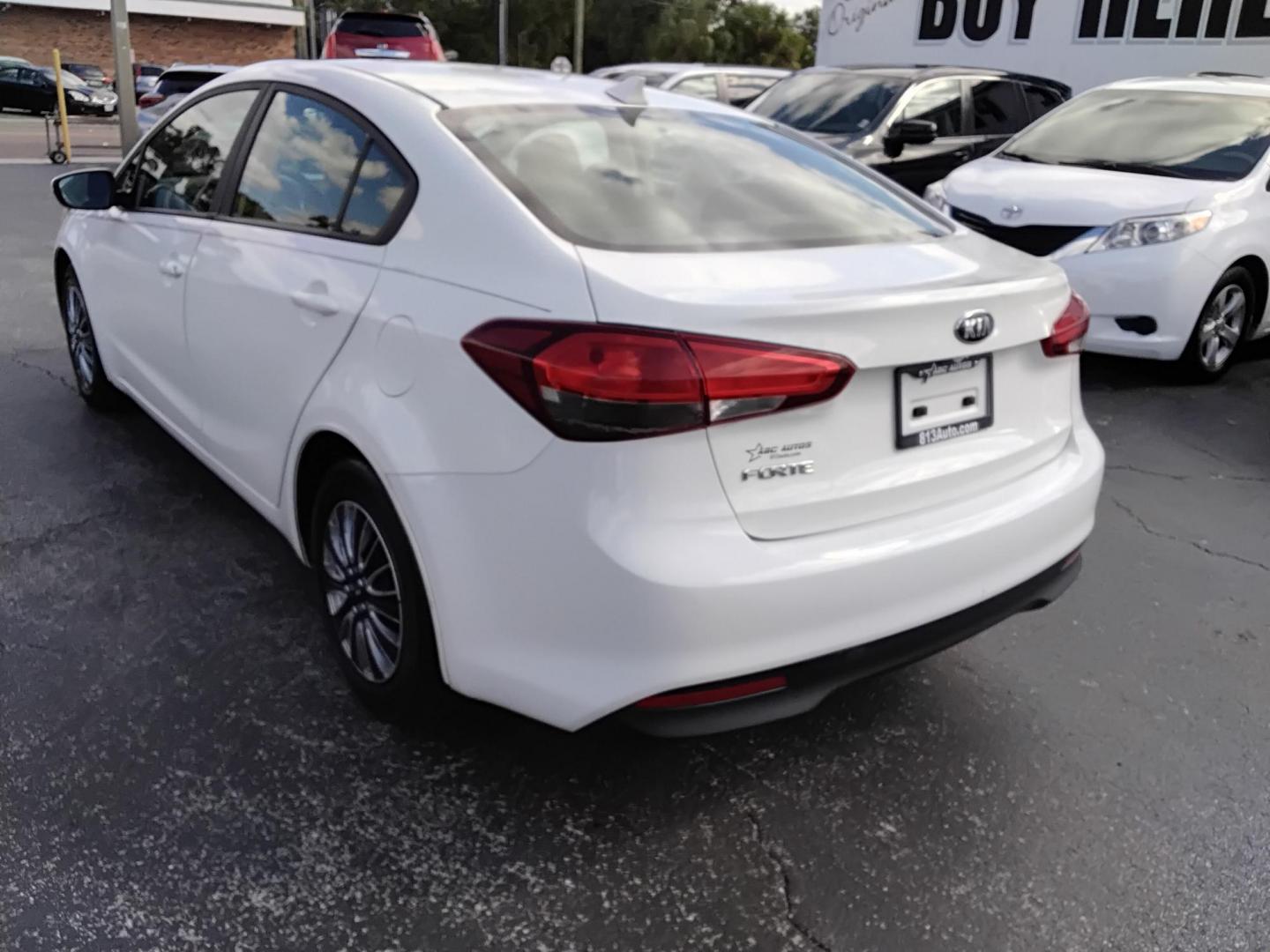 2017 White /Black Kia Forte LX 6M (3KPFK4A7XHE) with an 2.0L L4 DOHC 16V engine, 6M transmission, located at 6112 N Florida Avenue, Tampa, FL, 33604, (888) 521-5131, 27.954929, -82.459534 - 499 DOWN PLUS TAX & TAG. - Photo#4
