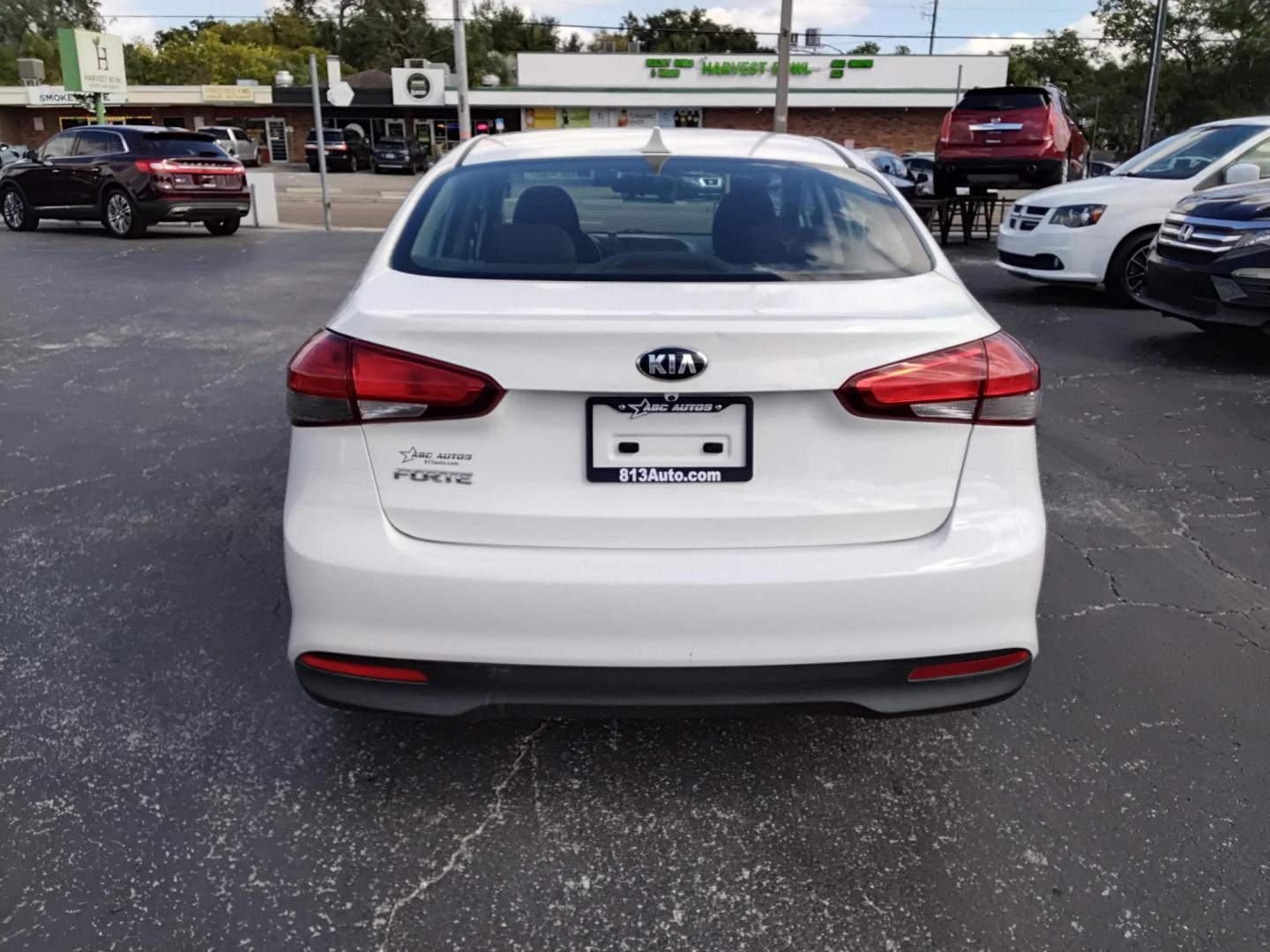 2017 White /Black Kia Forte LX 6M (3KPFK4A7XHE) with an 2.0L L4 DOHC 16V engine, 6M transmission, located at 6112 N Florida Avenue, Tampa, FL, 33604, (888) 521-5131, 27.954929, -82.459534 - 499 DOWN PLUS TAX & TAG. - Photo#6