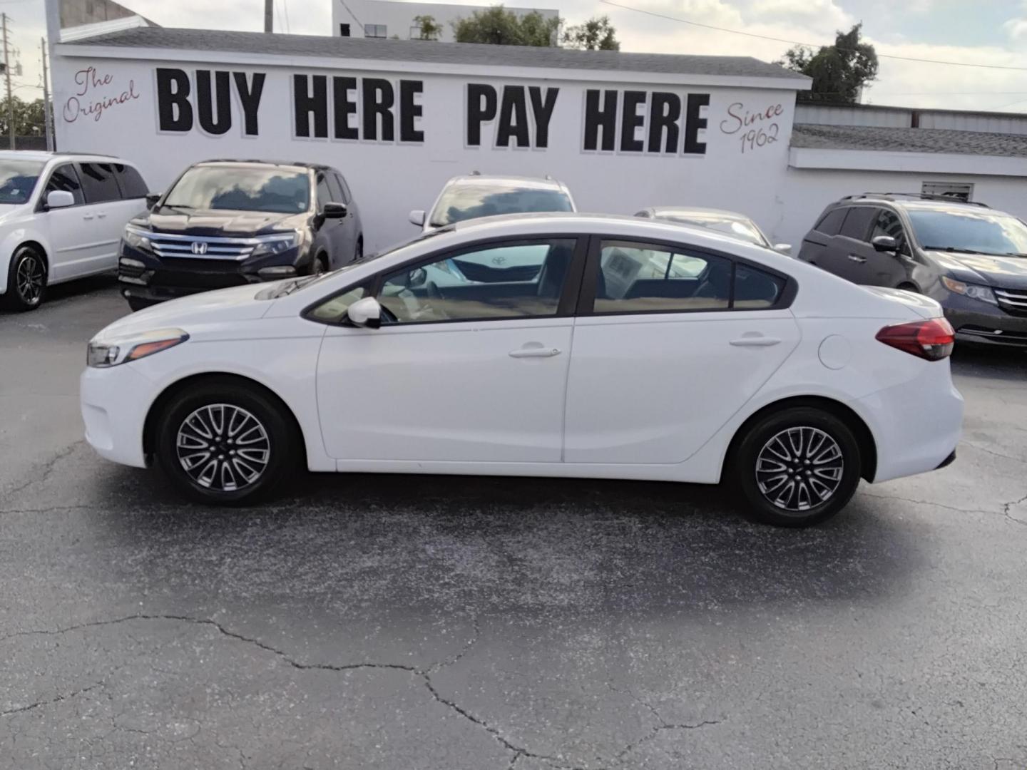 2017 White /Black Kia Forte LX 6M (3KPFK4A7XHE) with an 2.0L L4 DOHC 16V engine, 6M transmission, located at 6112 N Florida Avenue, Tampa, FL, 33604, (888) 521-5131, 27.954929, -82.459534 - 499 DOWN PLUS TAX & TAG. - Photo#0