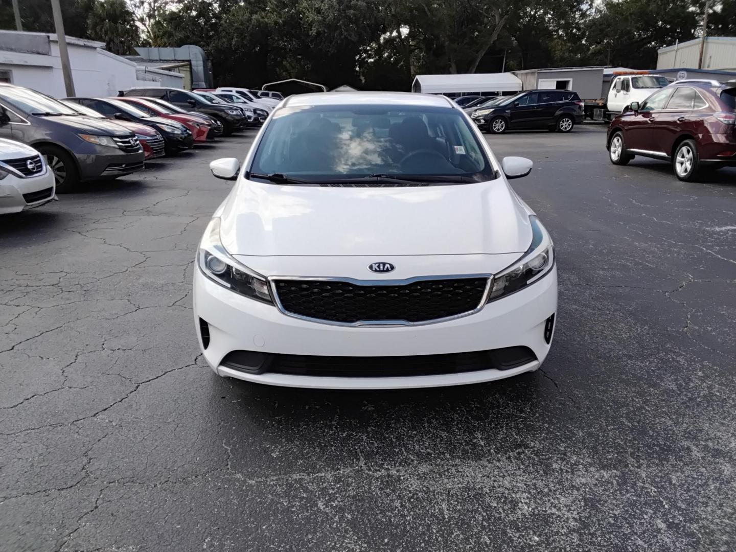 2017 White /Black Kia Forte LX 6M (3KPFK4A7XHE) with an 2.0L L4 DOHC 16V engine, 6M transmission, located at 6112 N Florida Avenue, Tampa, FL, 33604, (888) 521-5131, 27.954929, -82.459534 - 499 DOWN PLUS TAX & TAG. - Photo#1