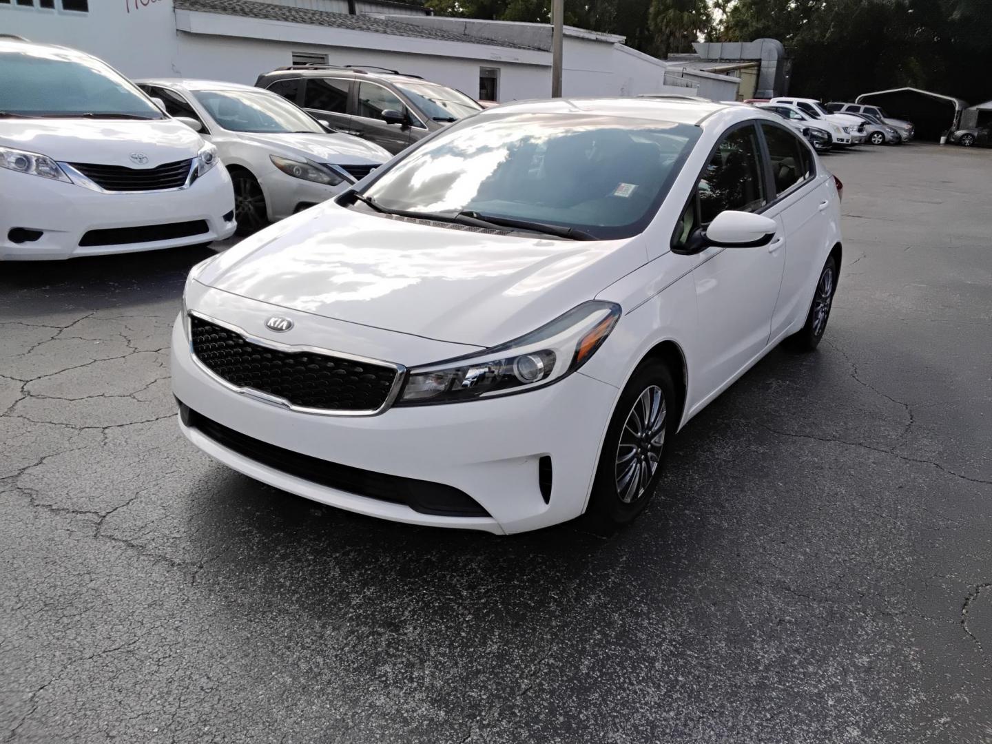 2017 White /Black Kia Forte LX 6M (3KPFK4A7XHE) with an 2.0L L4 DOHC 16V engine, 6M transmission, located at 6112 N Florida Avenue, Tampa, FL, 33604, (888) 521-5131, 27.954929, -82.459534 - 499 DOWN PLUS TAX & TAG. - Photo#3