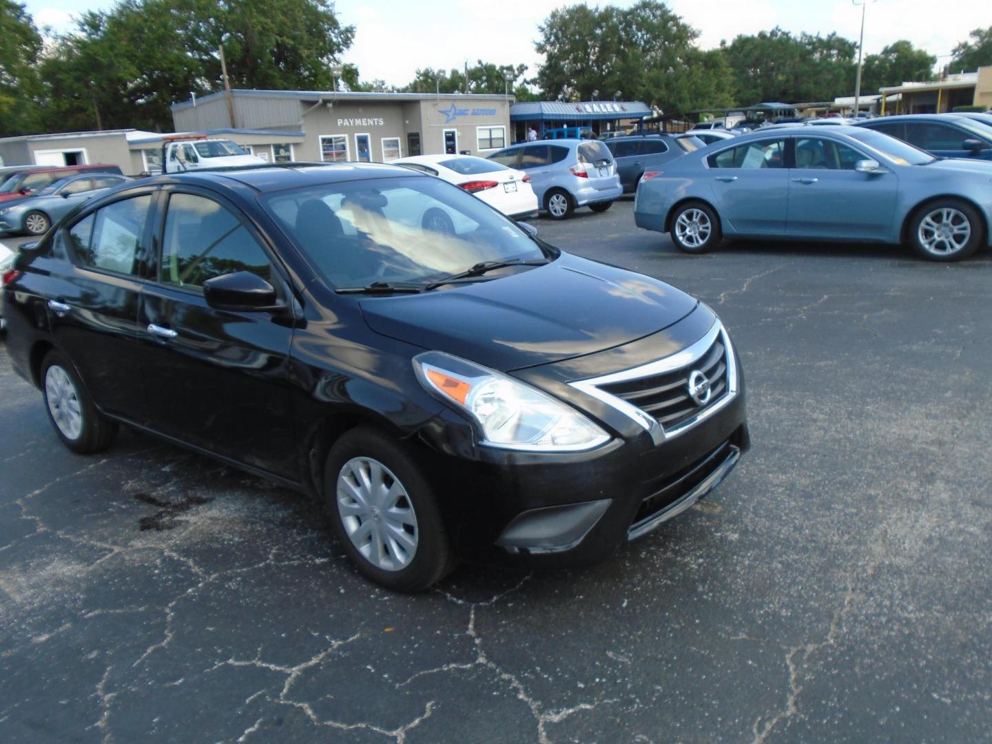 2018 BLACK /GREY Nissan Versa 1.6 SL Sedan (3N1CN7APXJL) with an 1.6L L4 DOHC 16V engine, CVT transmission, located at 6112 N Florida Avenue, Tampa, FL, 33604, (888) 521-5131, 27.954929, -82.459534 - 499 DOWN PLUS TAX & TAG. - Photo#1