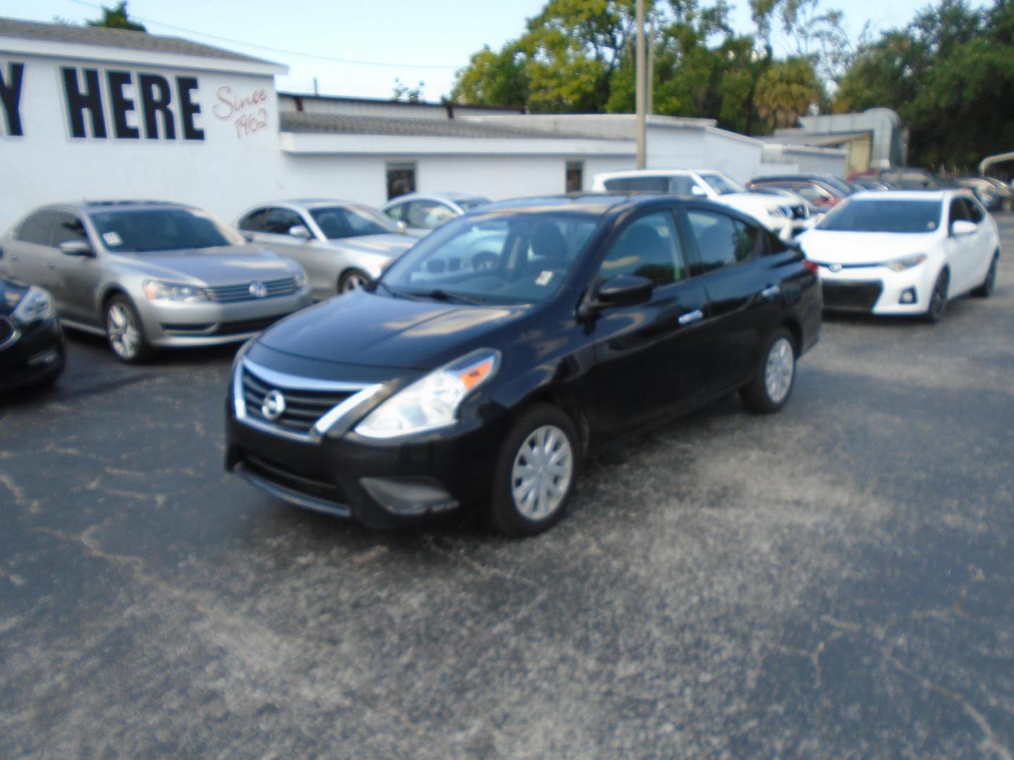 2018 BLACK /GREY Nissan Versa 1.6 SL Sedan (3N1CN7APXJL) with an 1.6L L4 DOHC 16V engine, CVT transmission, located at 6112 N Florida Avenue, Tampa, FL, 33604, (888) 521-5131, 27.954929, -82.459534 - 499 DOWN PLUS TAX & TAG. - Photo#2