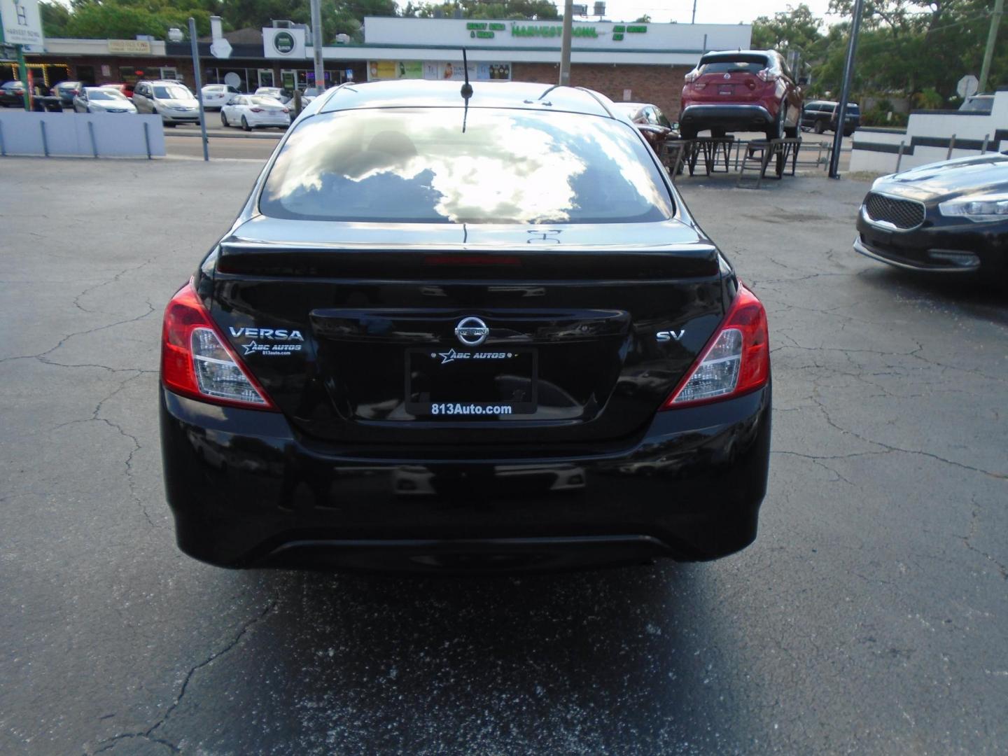 2018 BLACK /GREY Nissan Versa 1.6 SL Sedan (3N1CN7APXJL) with an 1.6L L4 DOHC 16V engine, CVT transmission, located at 6112 N Florida Avenue, Tampa, FL, 33604, (888) 521-5131, 27.954929, -82.459534 - 499 DOWN PLUS TAX & TAG. - Photo#4