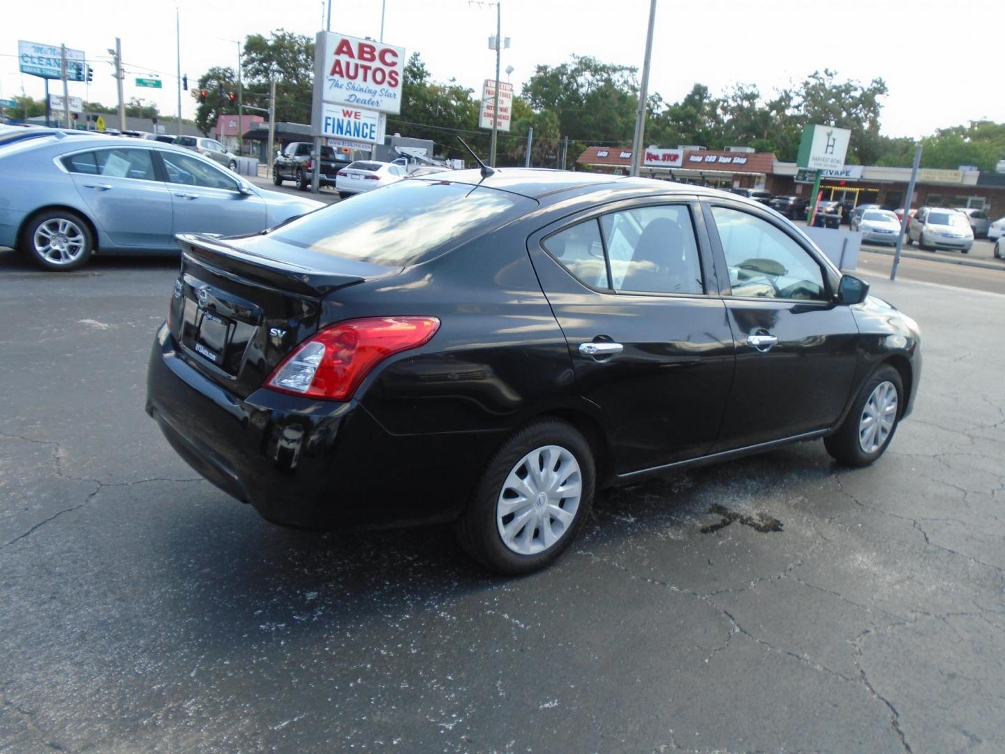 2018 BLACK /GREY Nissan Versa 1.6 SL Sedan (3N1CN7APXJL) with an 1.6L L4 DOHC 16V engine, CVT transmission, located at 6112 N Florida Avenue, Tampa, FL, 33604, (888) 521-5131, 27.954929, -82.459534 - 499 DOWN PLUS TAX & TAG. - Photo#5