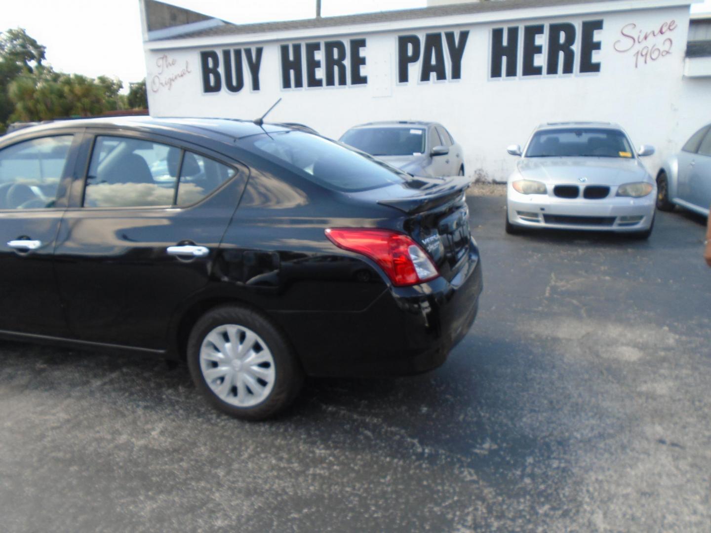 2018 BLACK /GREY Nissan Versa 1.6 SL Sedan (3N1CN7APXJL) with an 1.6L L4 DOHC 16V engine, CVT transmission, located at 6112 N Florida Avenue, Tampa, FL, 33604, (888) 521-5131, 27.954929, -82.459534 - 499 DOWN PLUS TAX & TAG. - Photo#3