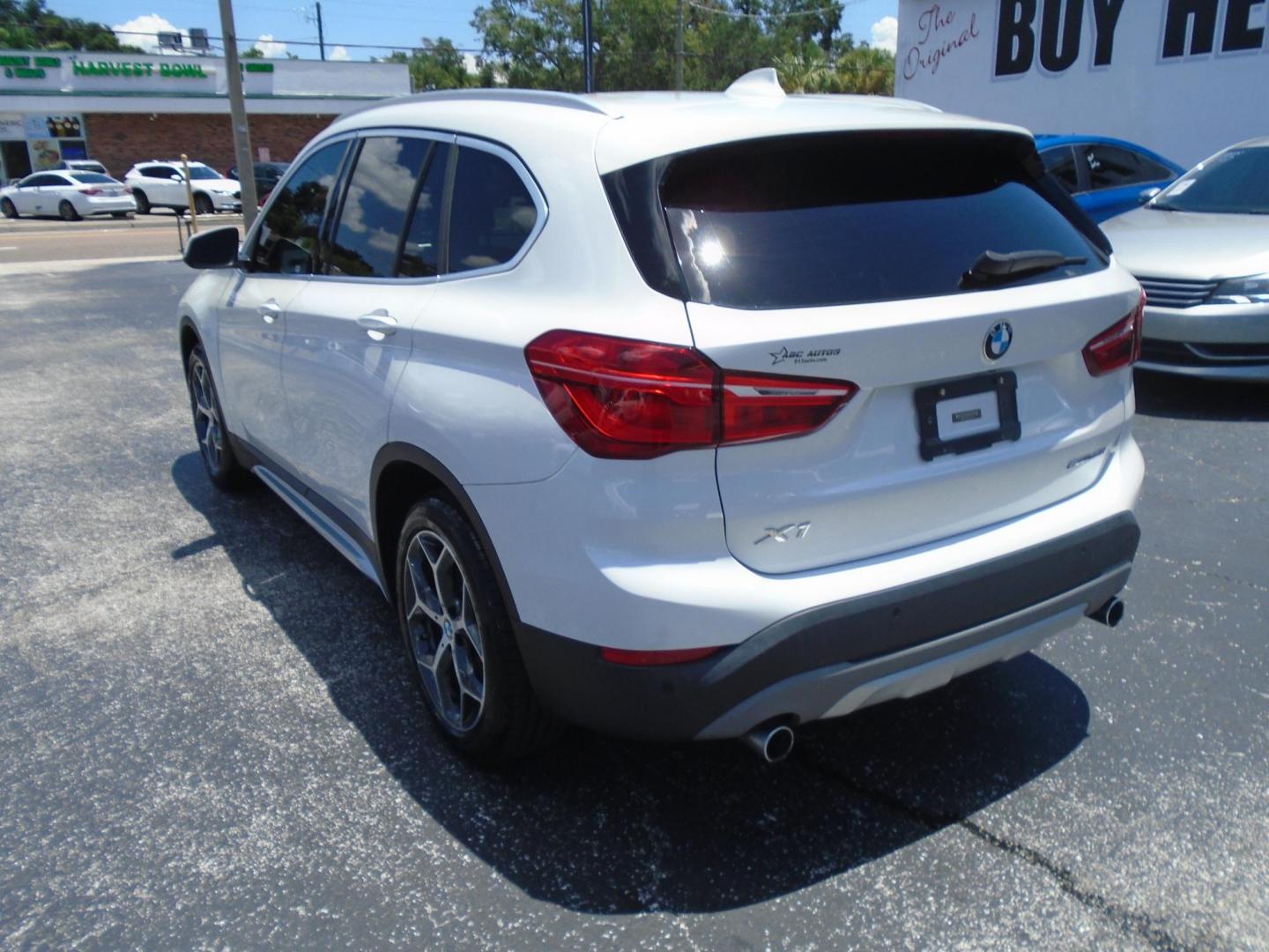 2018 White /Beige BMW X1 sDrive28i (WBXHU7C39J5) with an 2.0L L4 DOHC 16V engine, 8A transmission, located at 6112 N Florida Avenue, Tampa, FL, 33604, (888) 521-5131, 27.954929, -82.459534 - 499$ DOWN PLUS TAX & TAG. - Photo#6