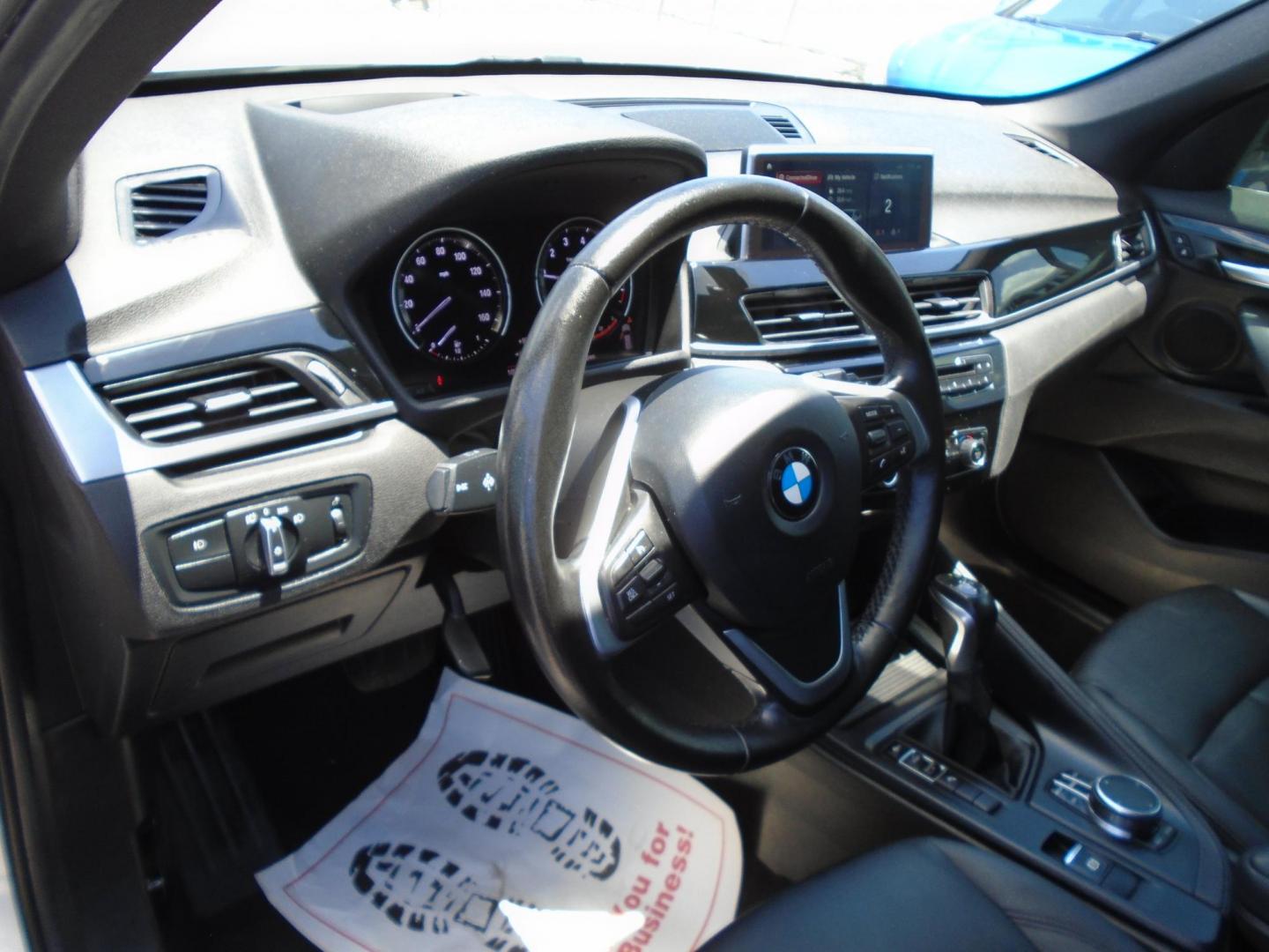 2018 White /Beige BMW X1 sDrive28i (WBXHU7C39J5) with an 2.0L L4 DOHC 16V engine, 8A transmission, located at 6112 N Florida Avenue, Tampa, FL, 33604, (888) 521-5131, 27.954929, -82.459534 - 499$ DOWN PLUS TAX & TAG. - Photo#9