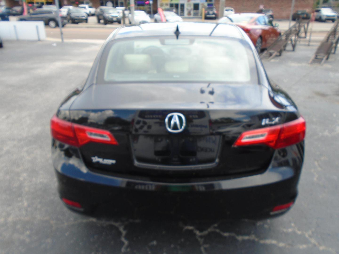 2013 BLACK /Beige Acura ILX 5-Spd AT w/ Technology Package (19VDE1F74DE) with an 2.0L L4 16V DOHC engine, 5-Speed Automatic transmission, located at 6112 N Florida Avenue, Tampa, FL, 33604, (888) 521-5131, 27.954929, -82.459534 - 499$ DOWN PLUS TAX & TAG. - Photo#4