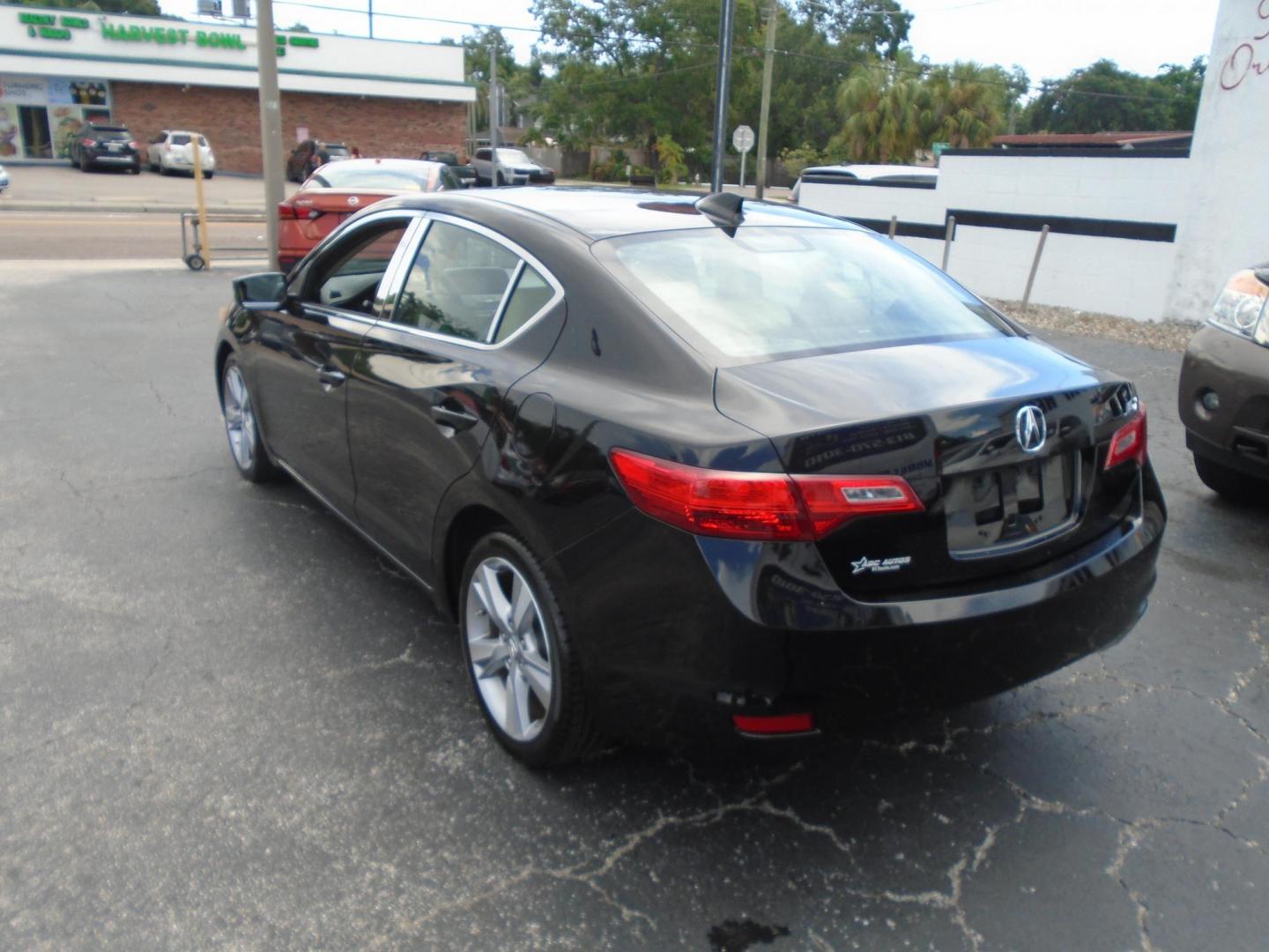 2013 BLACK /Beige Acura ILX 5-Spd AT w/ Technology Package (19VDE1F74DE) with an 2.0L L4 16V DOHC engine, 5-Speed Automatic transmission, located at 6112 N Florida Avenue, Tampa, FL, 33604, (888) 521-5131, 27.954929, -82.459534 - 499$ DOWN PLUS TAX & TAG. - Photo#5