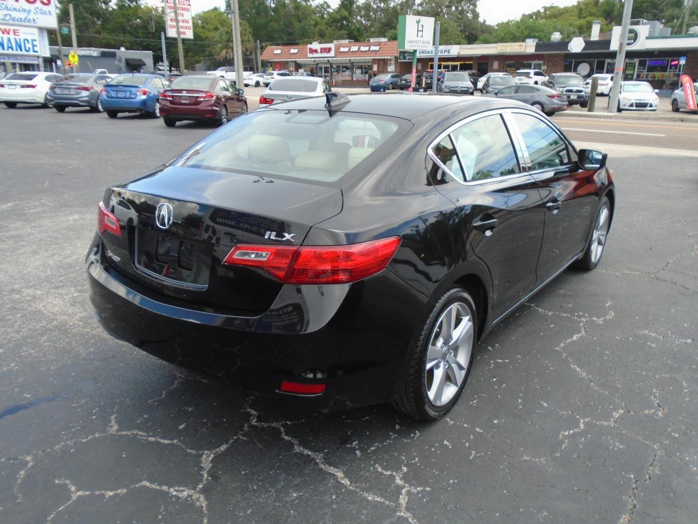 2013 BLACK /Beige Acura ILX 5-Spd AT w/ Technology Package (19VDE1F74DE) with an 2.0L L4 16V DOHC engine, 5-Speed Automatic transmission, located at 6112 N Florida Avenue, Tampa, FL, 33604, (888) 521-5131, 27.954929, -82.459534 - 499$ DOWN PLUS TAX & TAG. - Photo#6