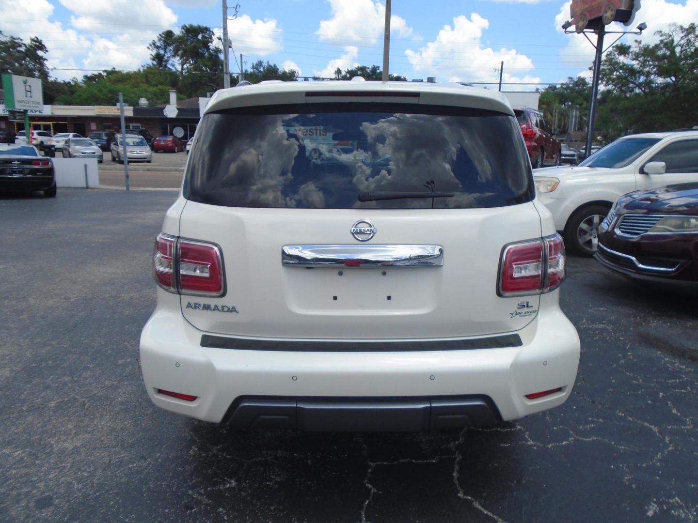 2019 White /BLACK Nissan Armada SL 2WD (JN8AY2ND6KX) with an 5.6L V8 DOHC 32V engine, 7A transmission, located at 6112 N Florida Avenue, Tampa, FL, 33604, (888) 521-5131, 27.954929, -82.459534 - 499$ DOWN PLUS TAX & TAG. - Photo#4