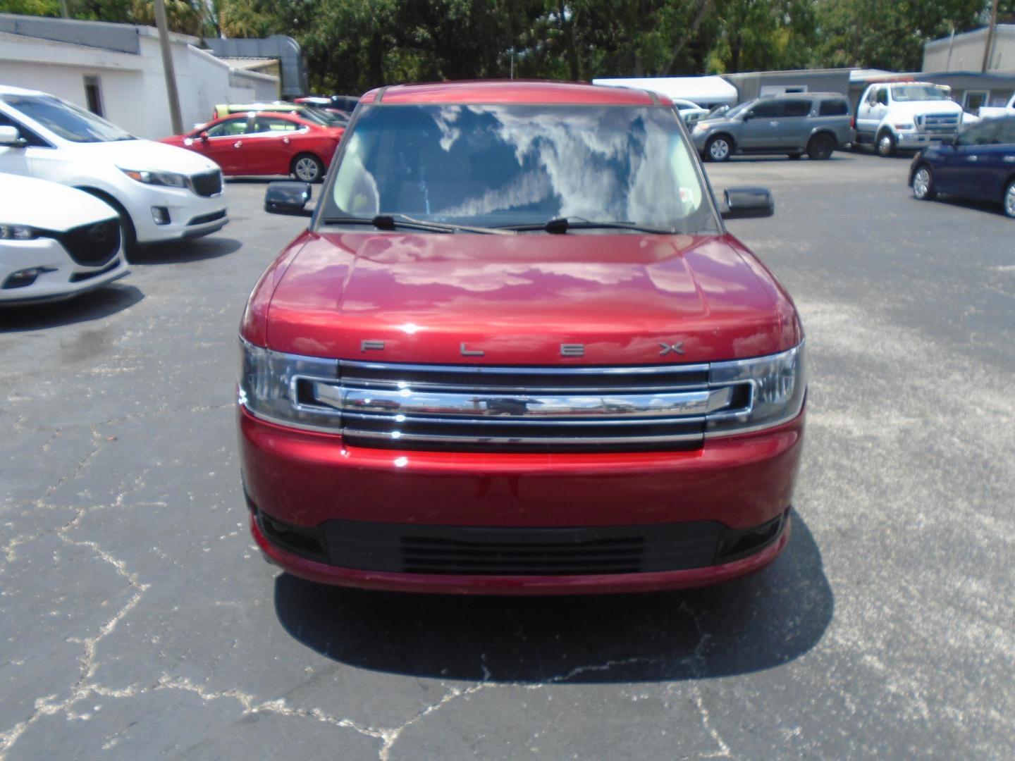 2015 RED /Beige Ford Flex SEL FWD (2FMGK5C8XFB) with an 3.5L V6 DOHC 24V engine, 6-Speed Automatic Overdrive transmission, located at 6112 N Florida Avenue, Tampa, FL, 33604, (888) 521-5131, 27.954929, -82.459534 - 499$ DOWN PLUS TAX & TAG. - Photo#1
