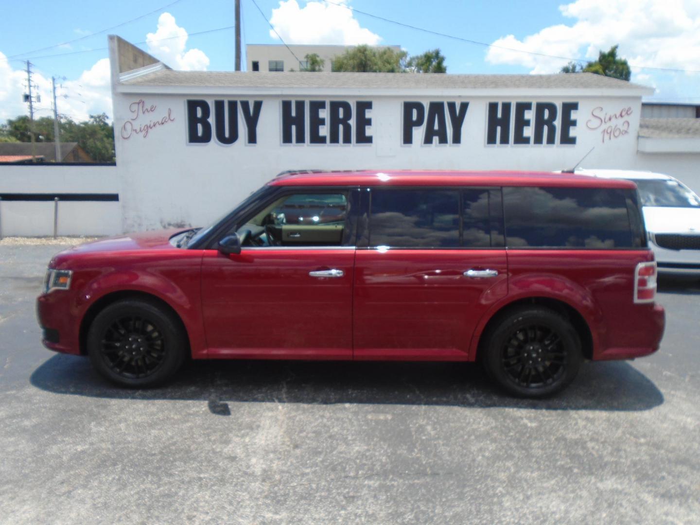 2015 RED /Beige Ford Flex SEL FWD (2FMGK5C8XFB) with an 3.5L V6 DOHC 24V engine, 6-Speed Automatic Overdrive transmission, located at 6112 N Florida Avenue, Tampa, FL, 33604, (888) 521-5131, 27.954929, -82.459534 - 499$ DOWN PLUS TAX & TAG. - Photo#0