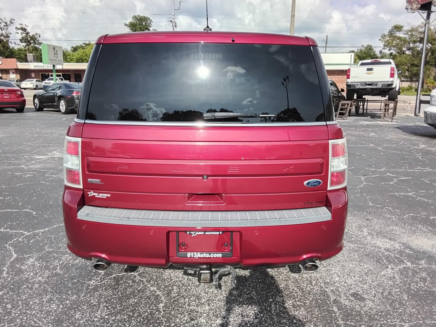 2015 RED /Beige Ford Flex SEL FWD (2FMGK5C8XFB) with an 3.5L V6 DOHC 24V engine, 6-Speed Automatic Overdrive transmission, located at 6112 N Florida Avenue, Tampa, FL, 33604, (888) 521-5131, 27.954929, -82.459534 - $499 DOWN PLUS TAX & TAG.- Photo#3