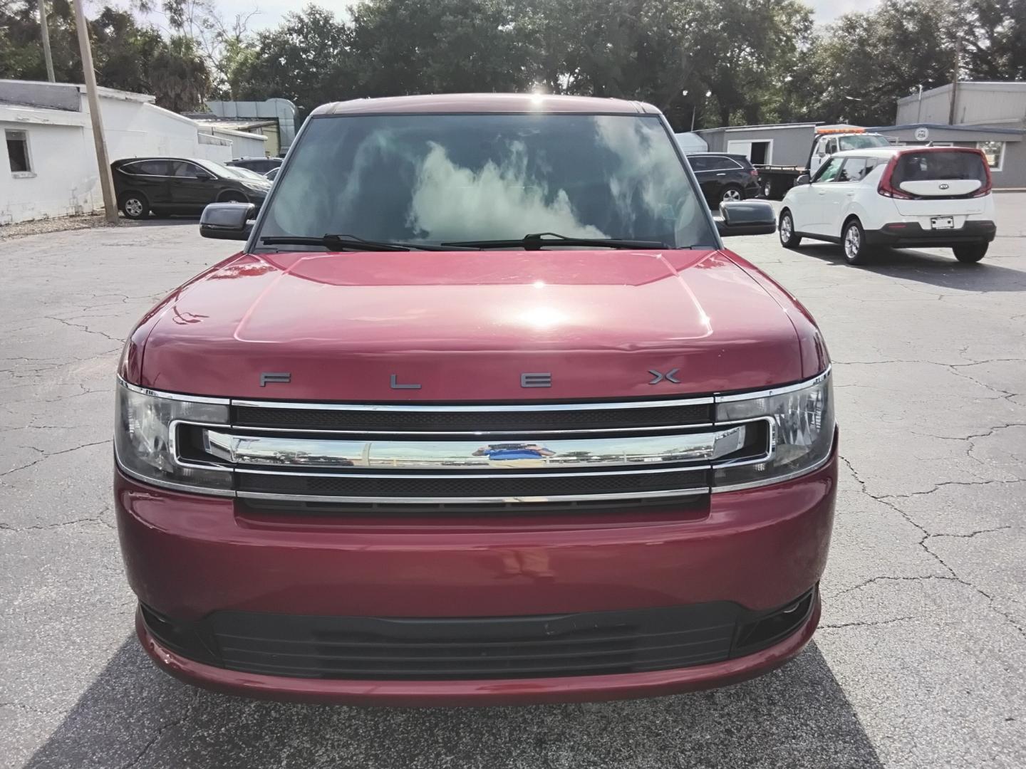 2015 RED /Beige Ford Flex SEL FWD (2FMGK5C8XFB) with an 3.5L V6 DOHC 24V engine, 6-Speed Automatic Overdrive transmission, located at 6112 N Florida Avenue, Tampa, FL, 33604, (888) 521-5131, 27.954929, -82.459534 - $499 DOWN PLUS TAX & TAG.- Photo#2