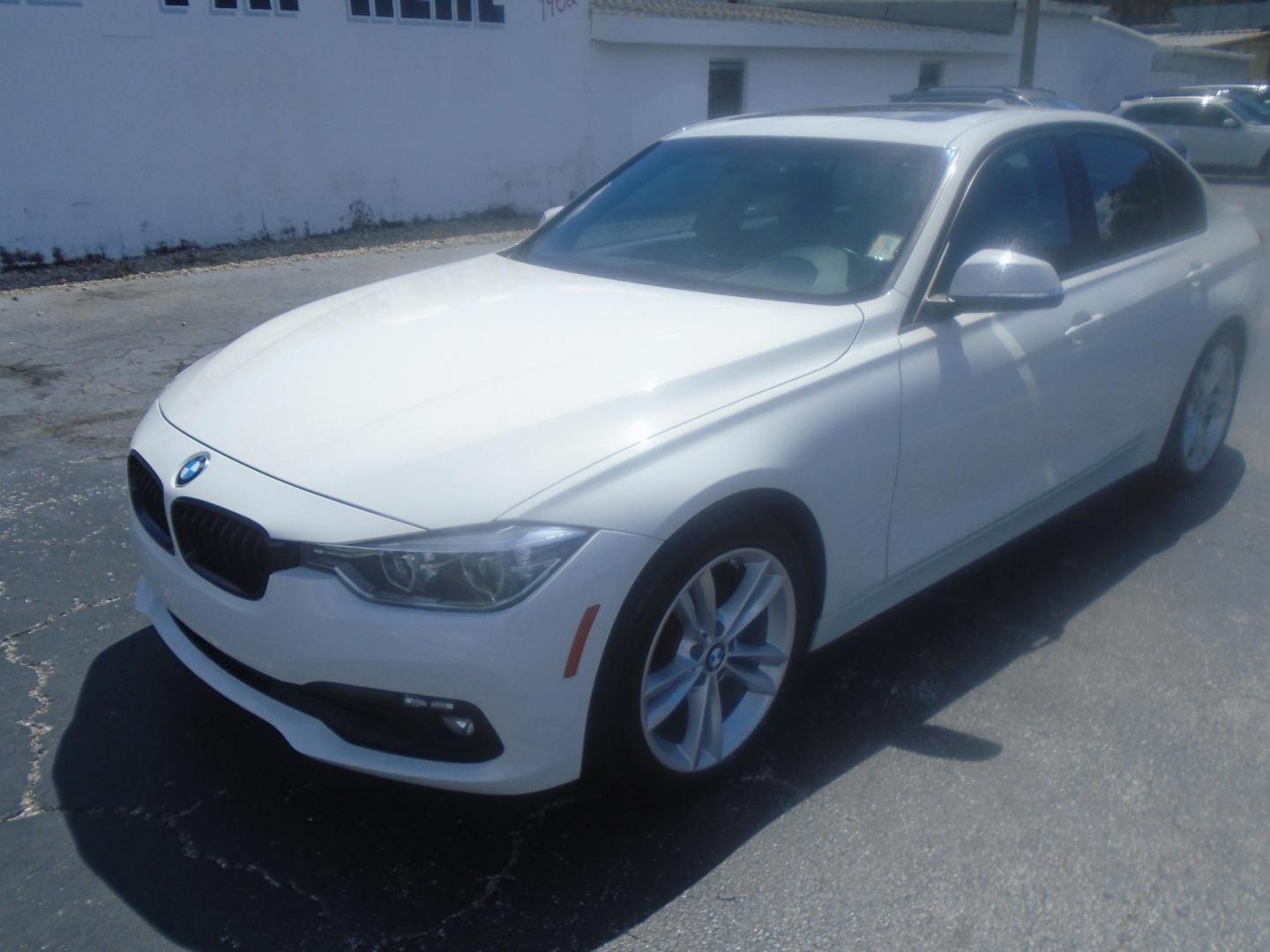 2018 White /Black BMW 3-Series 320i Sedan (WBA8A9C55JA) with an 2.0L L4 DOHC 16V engine, 8A transmission, located at 6112 N Florida Avenue, Tampa, FL, 33604, (888) 521-5131, 27.954929, -82.459534 - 499$ DOWN PLUS TAG & TAX. - Photo#2