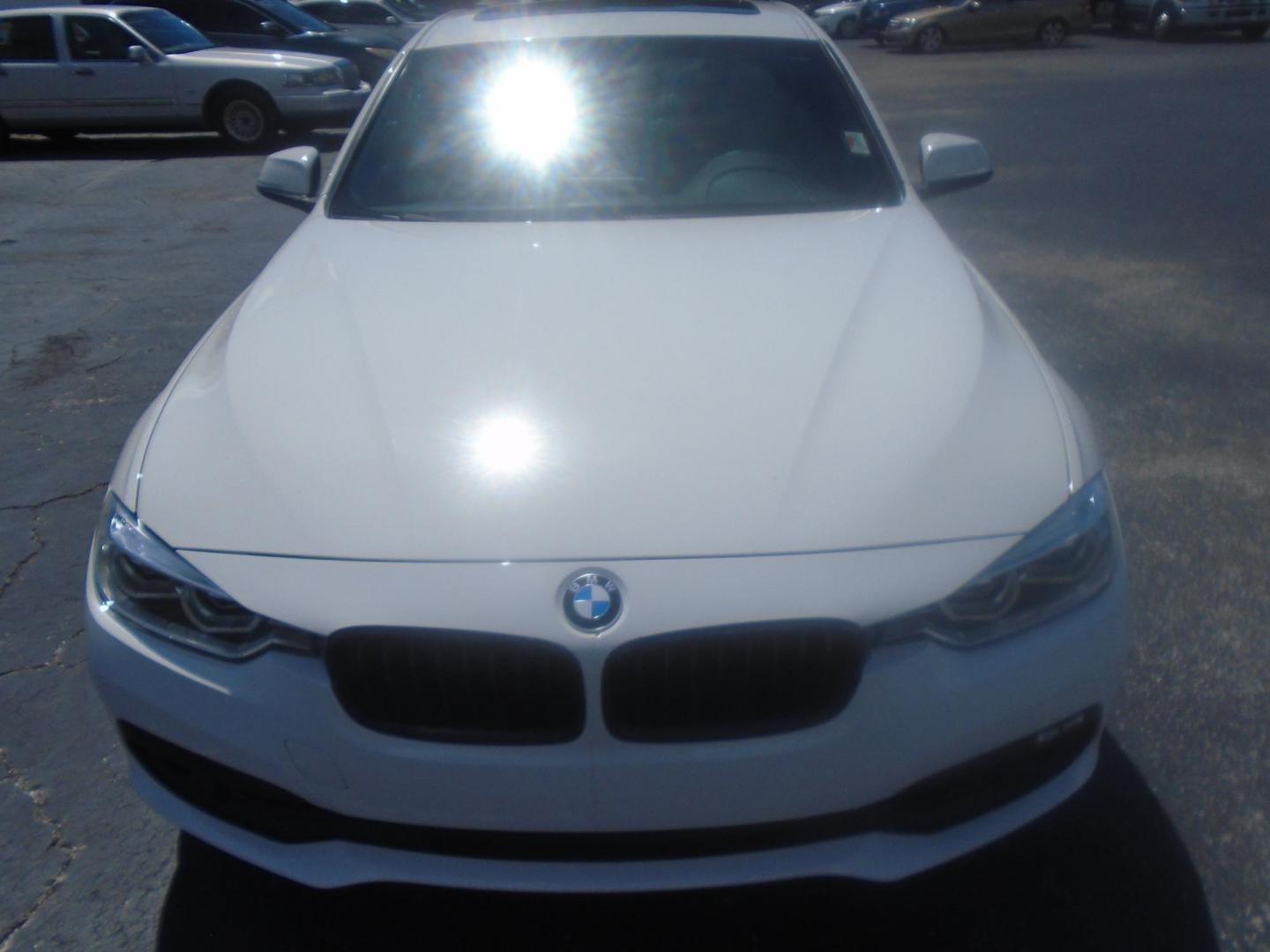 2018 White /Black BMW 3-Series 320i Sedan (WBA8A9C55JA) with an 2.0L L4 DOHC 16V engine, 8A transmission, located at 6112 N Florida Avenue, Tampa, FL, 33604, (888) 521-5131, 27.954929, -82.459534 - 499$ DOWN PLUS TAG & TAX. - Photo#3