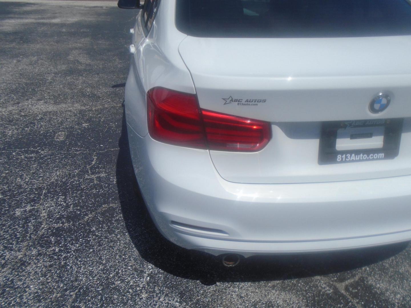 2018 White /Black BMW 3-Series 320i Sedan (WBA8A9C55JA) with an 2.0L L4 DOHC 16V engine, 8A transmission, located at 6112 N Florida Avenue, Tampa, FL, 33604, (888) 521-5131, 27.954929, -82.459534 - 499$ DOWN PLUS TAG & TAX. - Photo#12