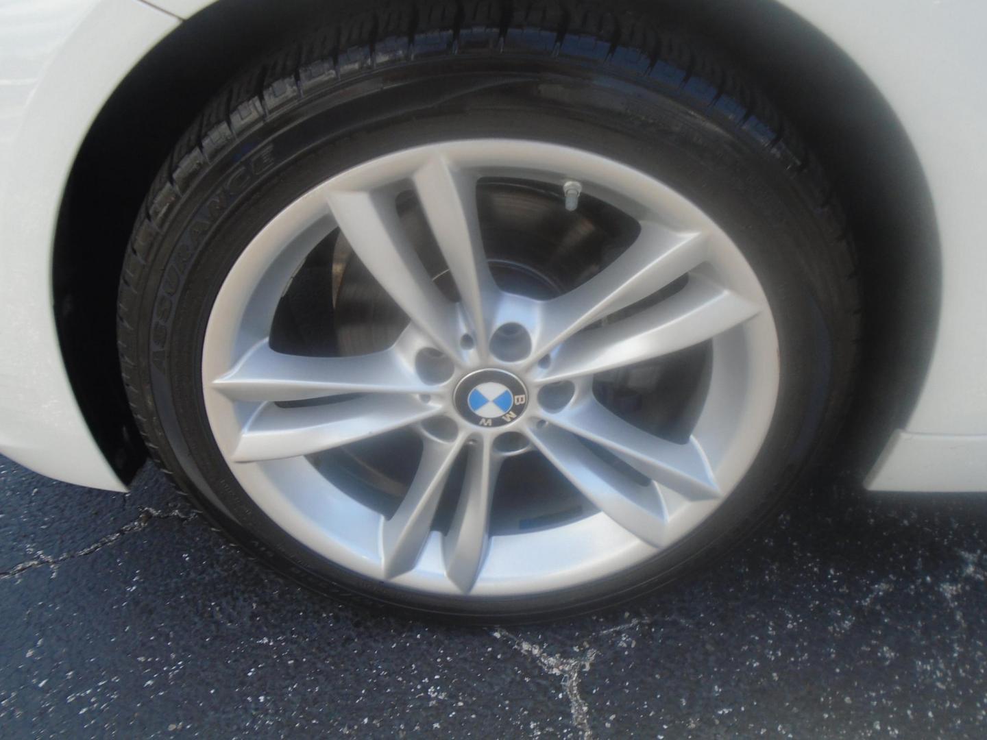 2018 White /Black BMW 3-Series 320i Sedan (WBA8A9C55JA) with an 2.0L L4 DOHC 16V engine, 8A transmission, located at 6112 N Florida Avenue, Tampa, FL, 33604, (888) 521-5131, 27.954929, -82.459534 - 499$ DOWN PLUS TAG & TAX. - Photo#26