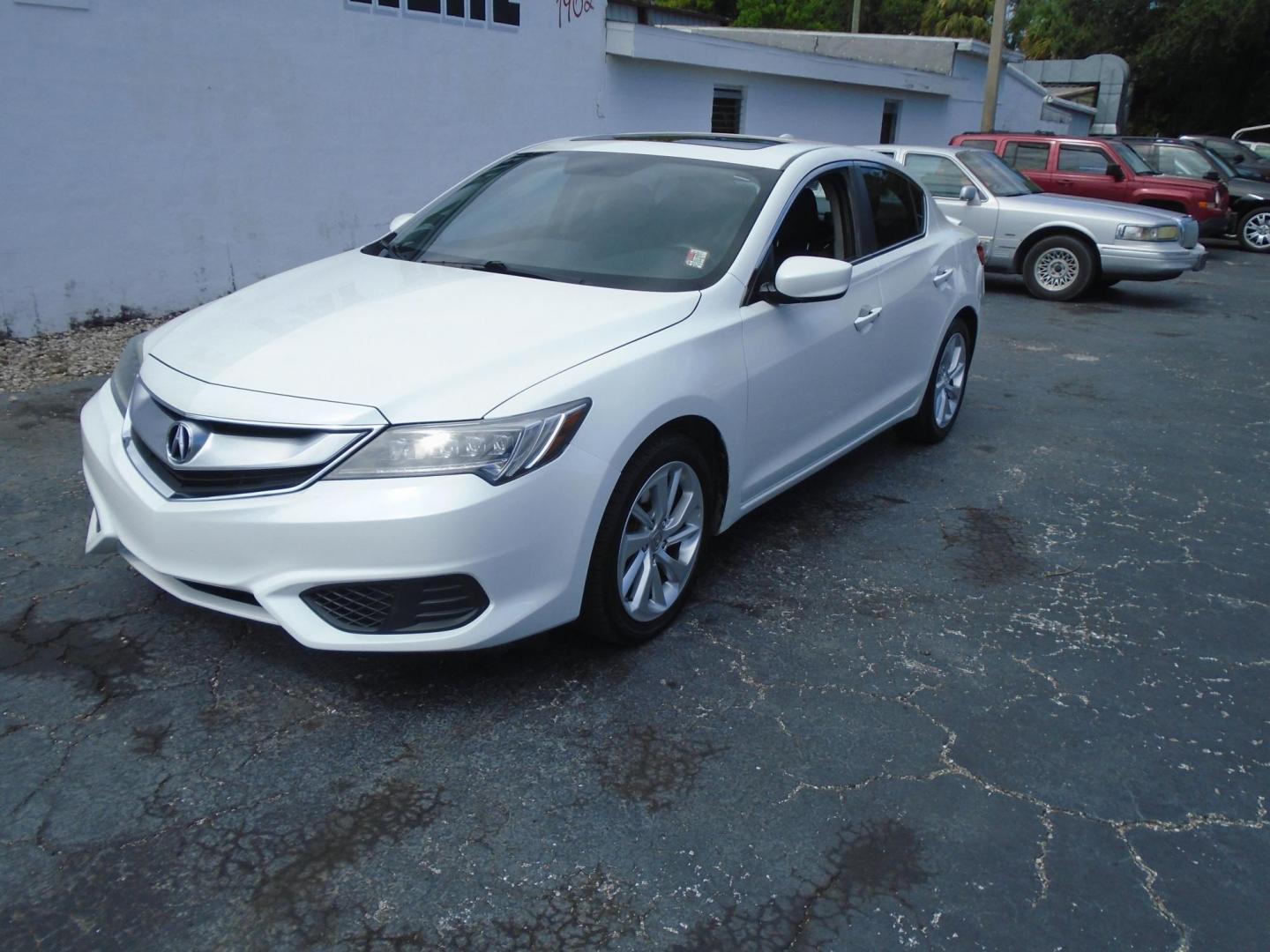2017 White /BLACK Acura ILX 8-Spd AT w/ AcuraWatch Plus Package (19UDE2F31HA) with an 2.0L L4 16V DOHC engine, 8A transmission, located at 6112 N Florida Avenue, Tampa, FL, 33604, (888) 521-5131, 27.954929, -82.459534 - 499$ down plus tax & tag. - Photo#1