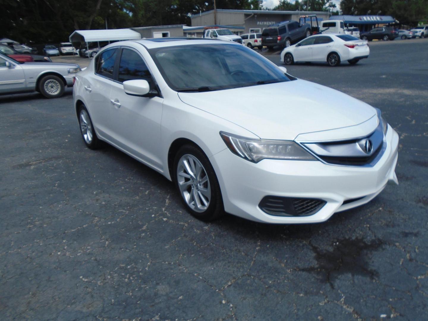2017 White /BLACK Acura ILX 8-Spd AT w/ AcuraWatch Plus Package (19UDE2F31HA) with an 2.0L L4 16V DOHC engine, 8A transmission, located at 6112 N Florida Avenue, Tampa, FL, 33604, (888) 521-5131, 27.954929, -82.459534 - 499$ down plus tax & tag. - Photo#2