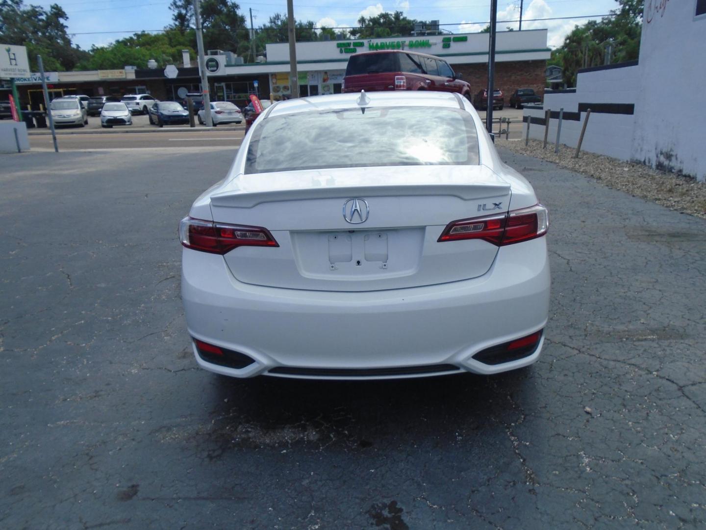 2017 White /BLACK Acura ILX 8-Spd AT w/ AcuraWatch Plus Package (19UDE2F31HA) with an 2.0L L4 16V DOHC engine, 8A transmission, located at 6112 N Florida Avenue, Tampa, FL, 33604, (888) 521-5131, 27.954929, -82.459534 - 499$ down plus tax & tag. - Photo#4