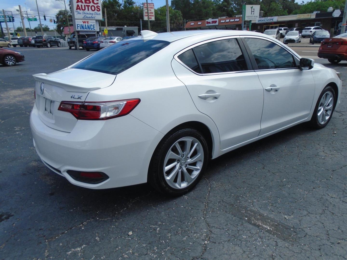 2017 White /BLACK Acura ILX 8-Spd AT w/ AcuraWatch Plus Package (19UDE2F31HA) with an 2.0L L4 16V DOHC engine, 8A transmission, located at 6112 N Florida Avenue, Tampa, FL, 33604, (888) 521-5131, 27.954929, -82.459534 - 499$ down plus tax & tag. - Photo#3