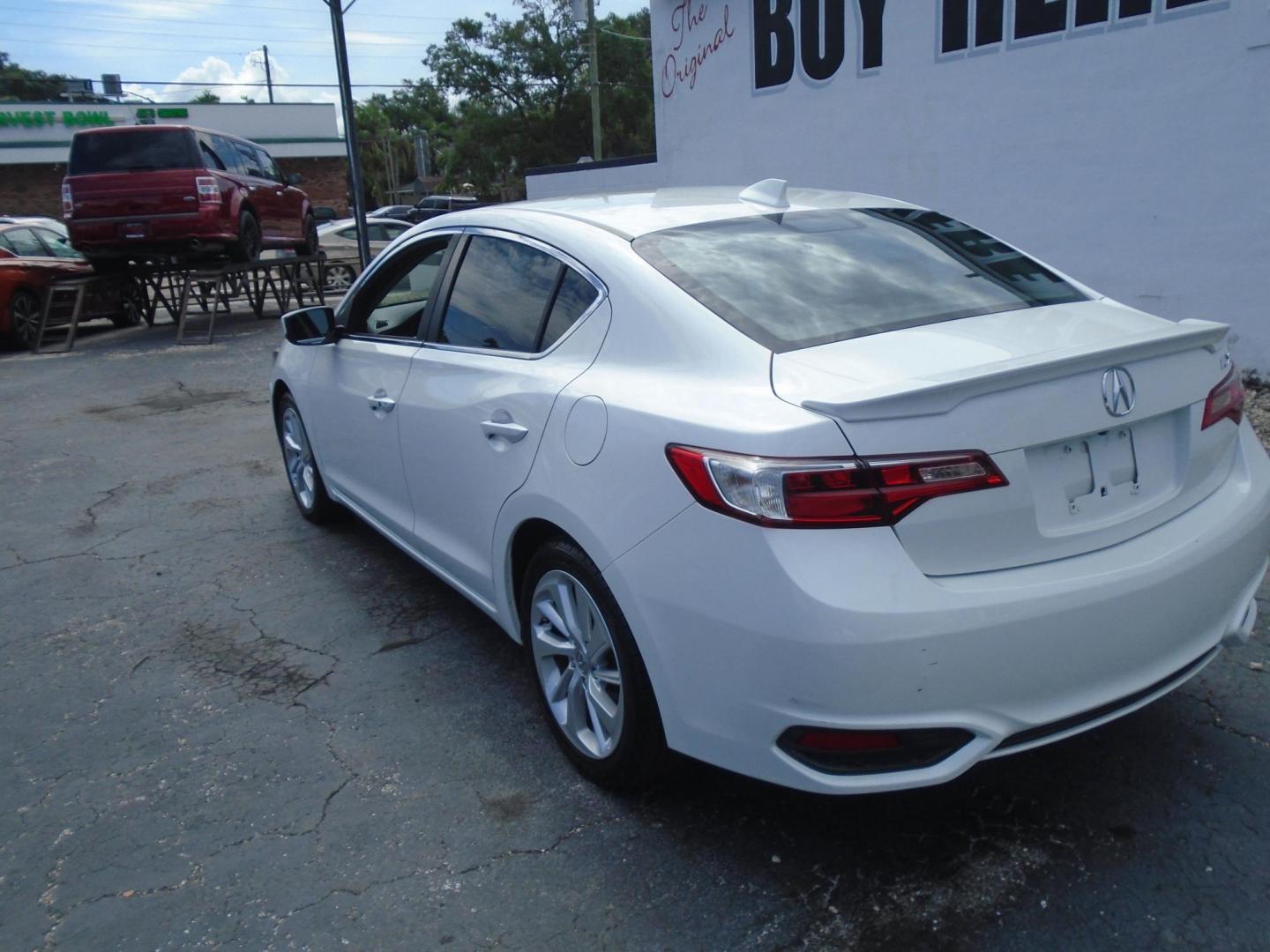 2017 White /BLACK Acura ILX 8-Spd AT w/ AcuraWatch Plus Package (19UDE2F31HA) with an 2.0L L4 16V DOHC engine, 8A transmission, located at 6112 N Florida Avenue, Tampa, FL, 33604, (888) 521-5131, 27.954929, -82.459534 - 499$ down plus tax & tag. - Photo#5