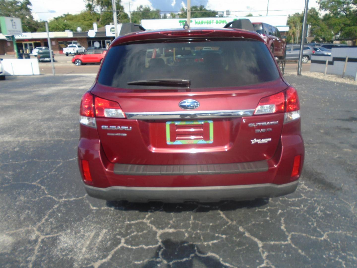 2011 RED /Beige Subaru Outback 3.6R Limited (4S4BRDLC4B2) with an 3.6L H6 DOHC 24V engine, 5-Speed Automatic transmission, located at 6112 N Florida Avenue, Tampa, FL, 33604, (888) 521-5131, 27.954929, -82.459534 - 499$ DOWN PLUS TAX & TAG. - Photo#4
