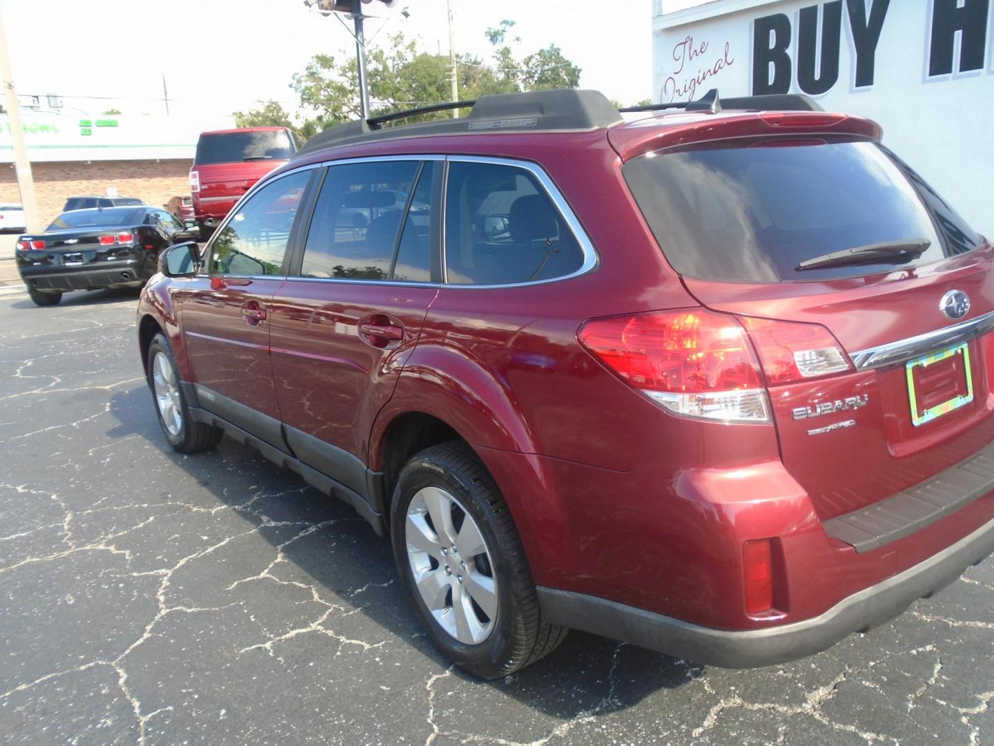 2011 RED /Beige Subaru Outback 3.6R Limited (4S4BRDLC4B2) with an 3.6L H6 DOHC 24V engine, 5-Speed Automatic transmission, located at 6112 N Florida Avenue, Tampa, FL, 33604, (888) 521-5131, 27.954929, -82.459534 - 499$ DOWN PLUS TAX & TAG. - Photo#5