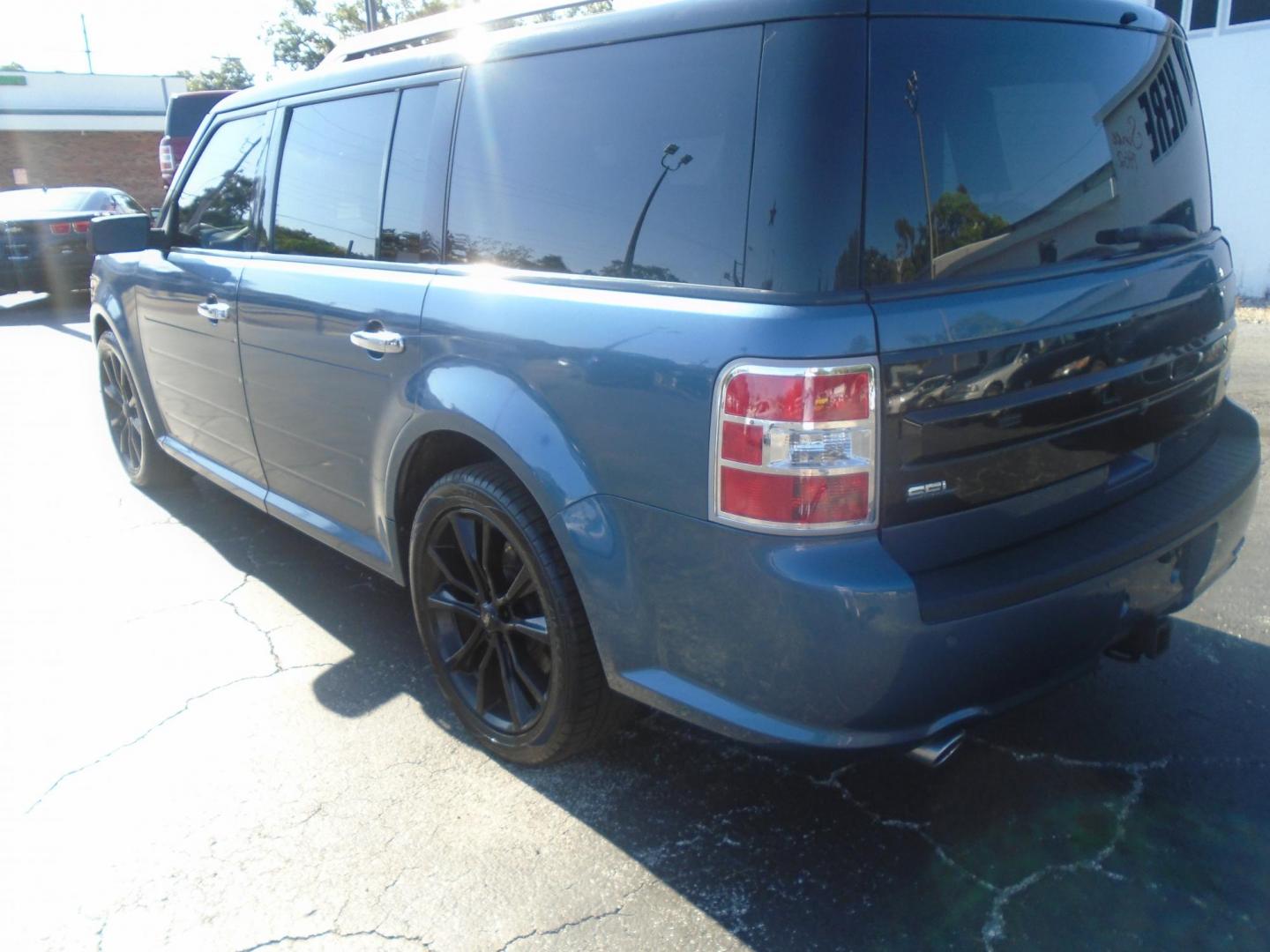 2018 Blue /Beige Ford Flex SEL FWD (2FMGK5C87JB) with an 3.5L V6 DOHC 24V engine, 6A transmission, located at 6112 N Florida Avenue, Tampa, FL, 33604, (888) 521-5131, 27.954929, -82.459534 - 499$ DOWN PLUS TAX & TAG. - Photo#5