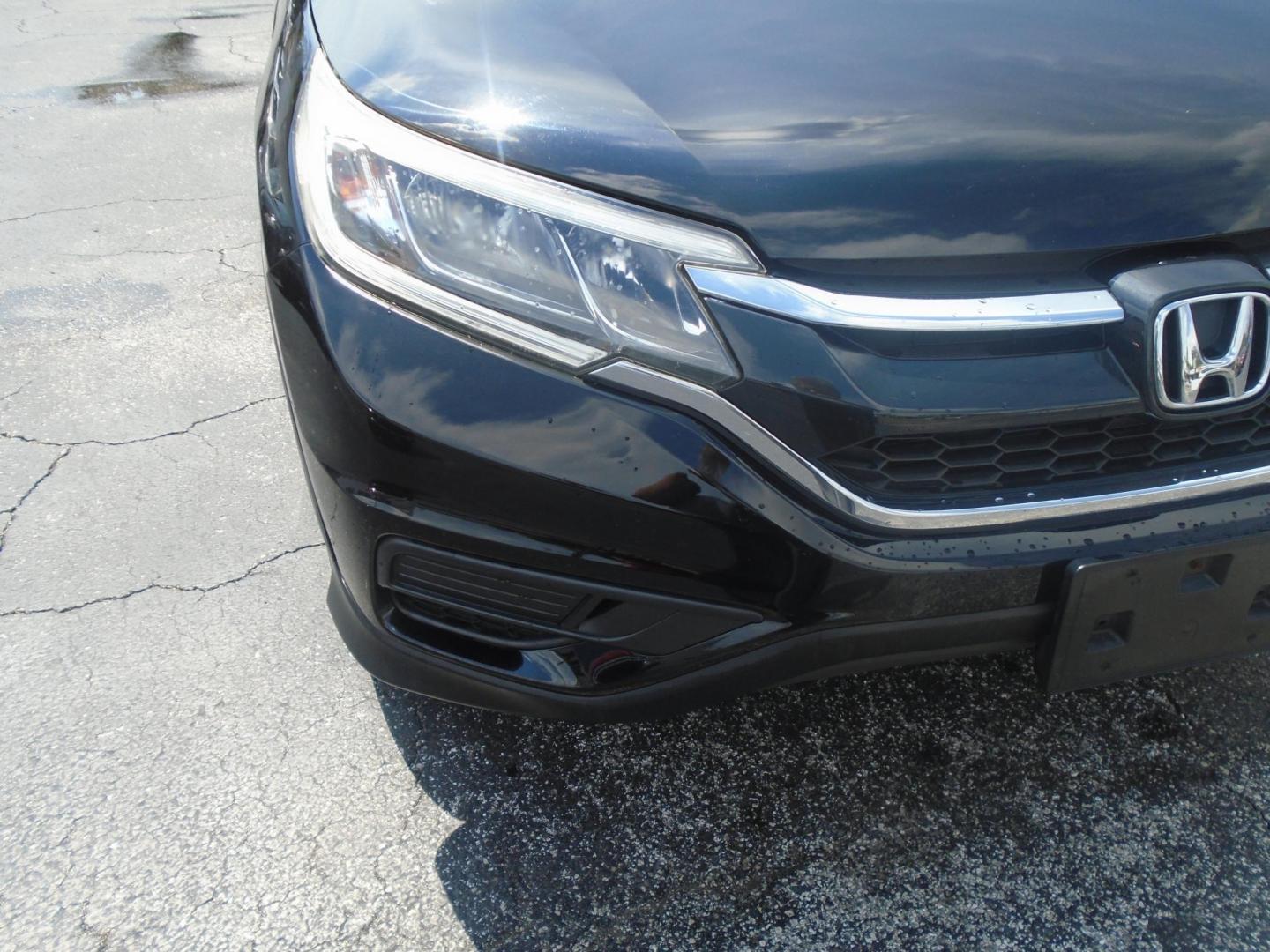 2016 BLACK /GREY Honda CR-V LX AWD (5J6RM4H31GL) with an 2.4L L4 DOHC 16V engine, CVT transmission, located at 6112 N Florida Avenue, Tampa, FL, 33604, (888) 521-5131, 27.954929, -82.459534 - 499$ DOWN PLUS TAX & TAG. - Photo#5