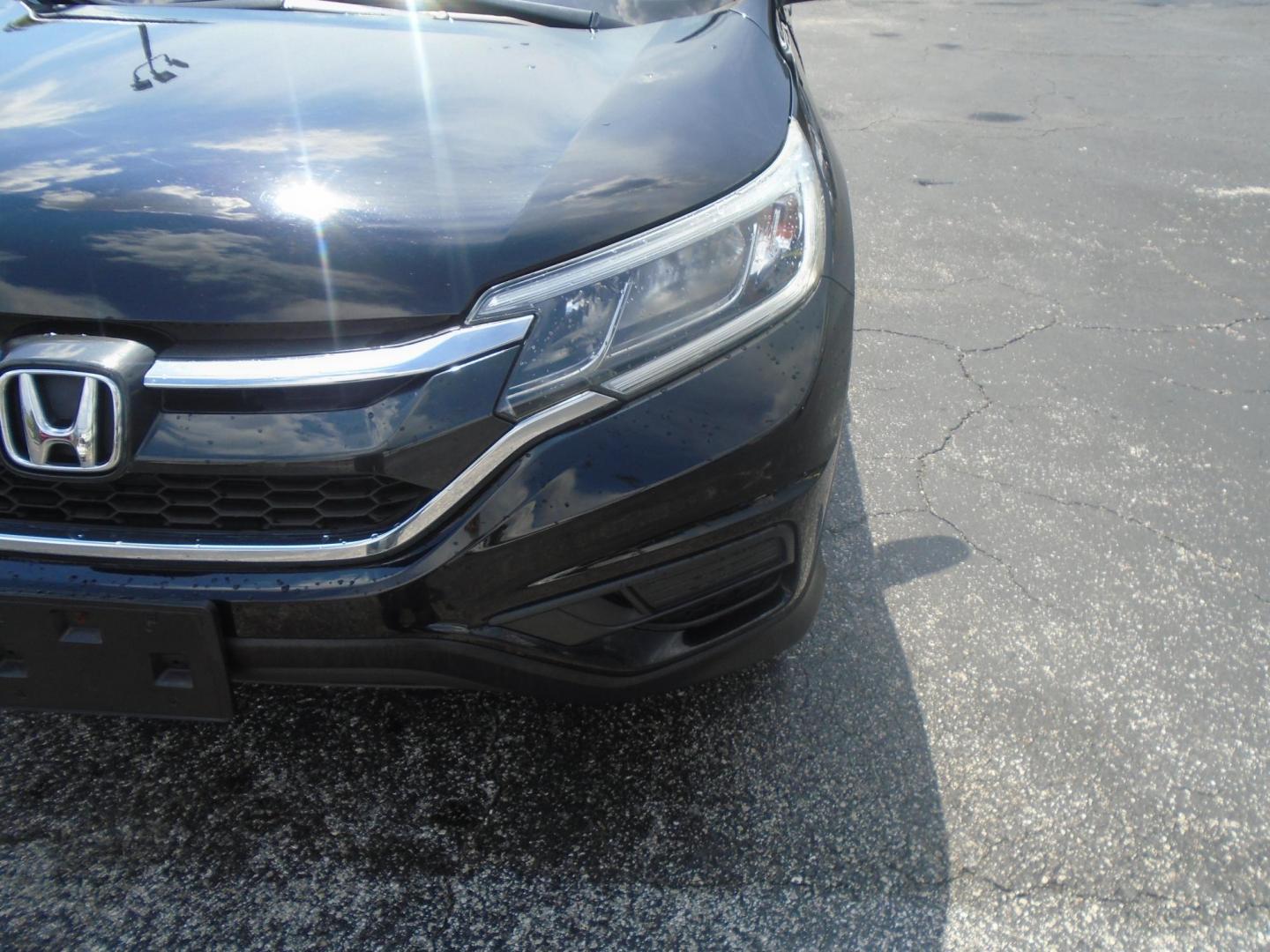 2016 BLACK /GREY Honda CR-V LX AWD (5J6RM4H31GL) with an 2.4L L4 DOHC 16V engine, CVT transmission, located at 6112 N Florida Avenue, Tampa, FL, 33604, (888) 521-5131, 27.954929, -82.459534 - 499$ DOWN PLUS TAX & TAG. - Photo#3