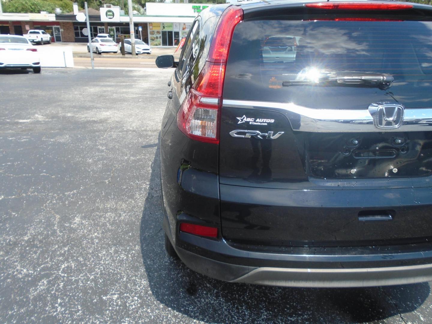 2016 BLACK /GREY Honda CR-V LX AWD (5J6RM4H31GL) with an 2.4L L4 DOHC 16V engine, CVT transmission, located at 6112 N Florida Avenue, Tampa, FL, 33604, (888) 521-5131, 27.954929, -82.459534 - 499$ DOWN PLUS TAX & TAG. - Photo#12