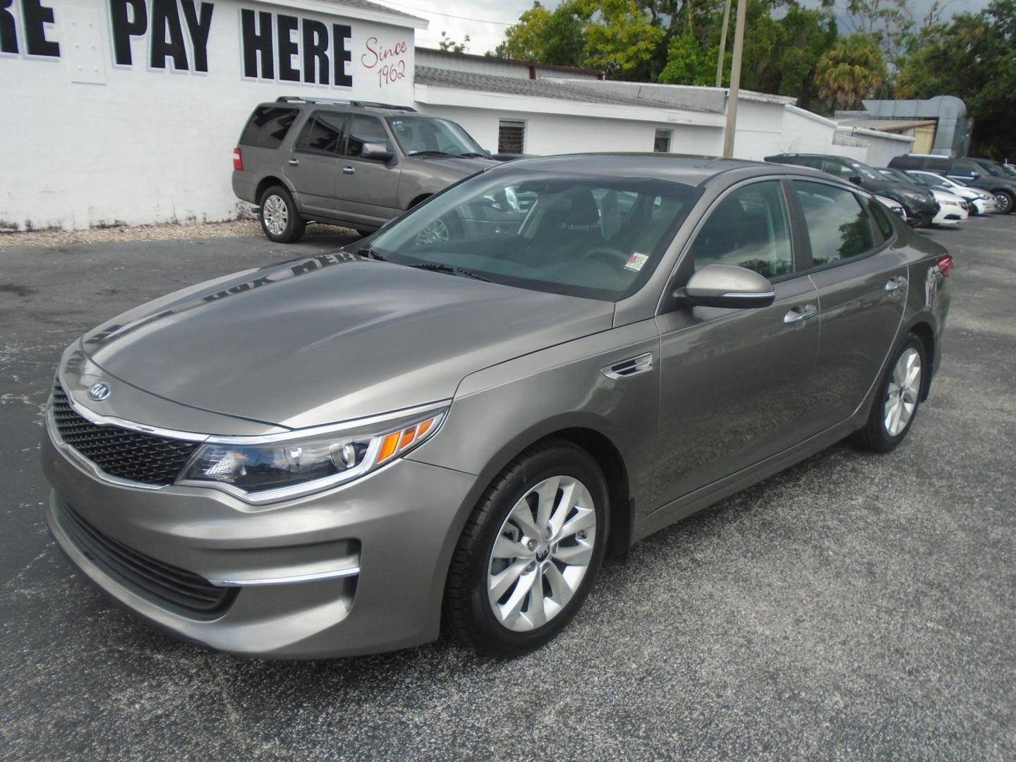 2018 GRAY /Grey Kia Optima LX (5XXGT4L35JG) with an 2.4L L4 DOHC 16V engine, 6A transmission, located at 6112 N Florida Avenue, Tampa, FL, 33604, (888) 521-5131, 27.954929, -82.459534 - 499$ down plus tax & tag. - Photo#4