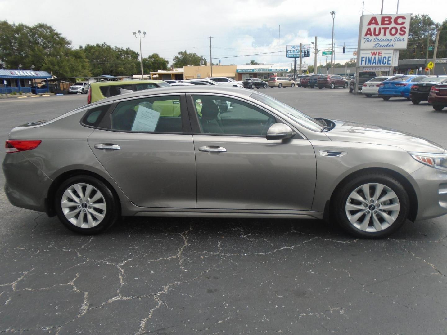 2018 GRAY /Grey Kia Optima LX (5XXGT4L35JG) with an 2.4L L4 DOHC 16V engine, 6A transmission, located at 6112 N Florida Avenue, Tampa, FL, 33604, (888) 521-5131, 27.954929, -82.459534 - 499$ down plus tax & tag. - Photo#9