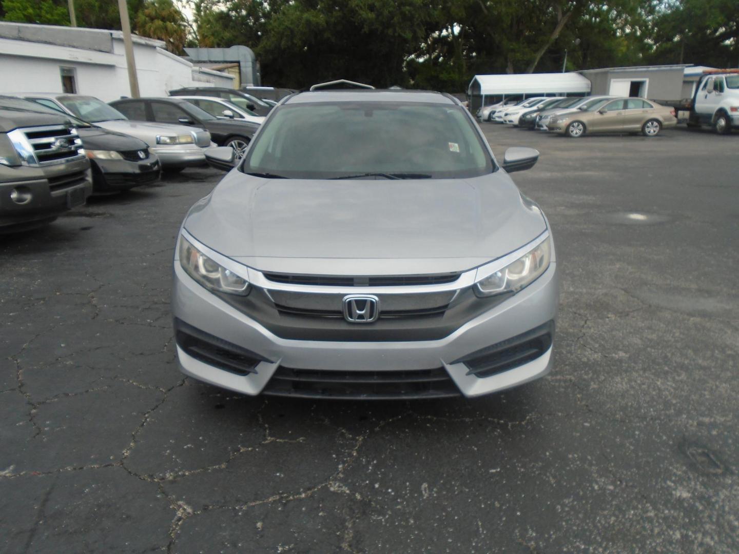 2017 SILVER /Grey Honda Civic LX Sedan CVT (19XFC2F59HE) with an 2.0L L4 DOHC 16V engine, CVT transmission, located at 6112 N Florida Avenue, Tampa, FL, 33604, (888) 521-5131, 27.954929, -82.459534 - 499$ down plus tax & tag. - Photo#1