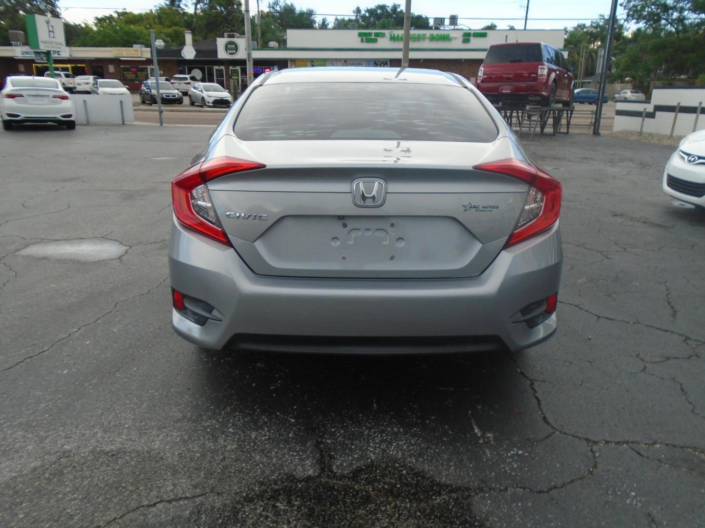 2017 SILVER /Grey Honda Civic LX Sedan CVT (19XFC2F59HE) with an 2.0L L4 DOHC 16V engine, CVT transmission, located at 6112 N Florida Avenue, Tampa, FL, 33604, (888) 521-5131, 27.954929, -82.459534 - 499$ down plus tax & tag. - Photo#4