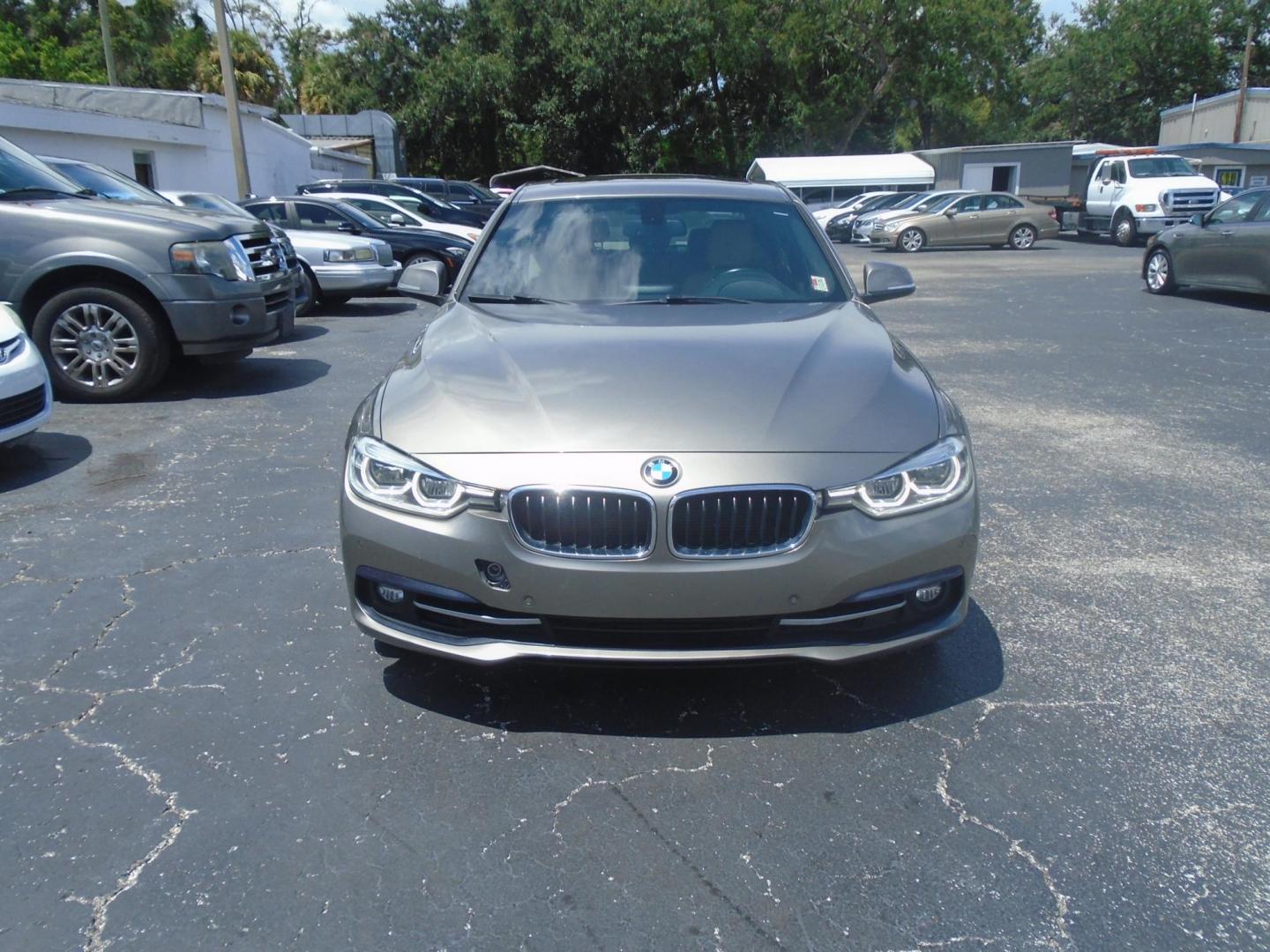 2016 SILVER /Beige BMW 3-Series 328i SULEV (WBA8E9G59GN) with an 2.0L L4 DOHC 16V engine, located at 6112 N Florida Avenue, Tampa, FL, 33604, (888) 521-5131, 27.954929, -82.459534 - 499$ down plus tax & tag. - Photo#1