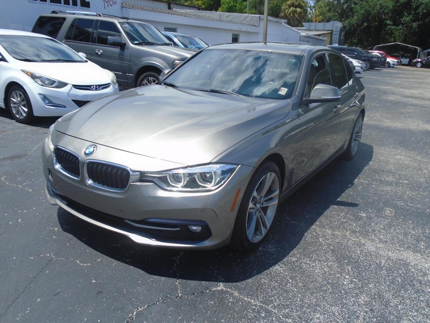 2016 SILVER /Beige BMW 3-Series 328i SULEV (WBA8E9G59GN) with an 2.0L L4 DOHC 16V engine, located at 6112 N Florida Avenue, Tampa, FL, 33604, (888) 521-5131, 27.954929, -82.459534 - 499$ down plus tax & tag. - Photo#2