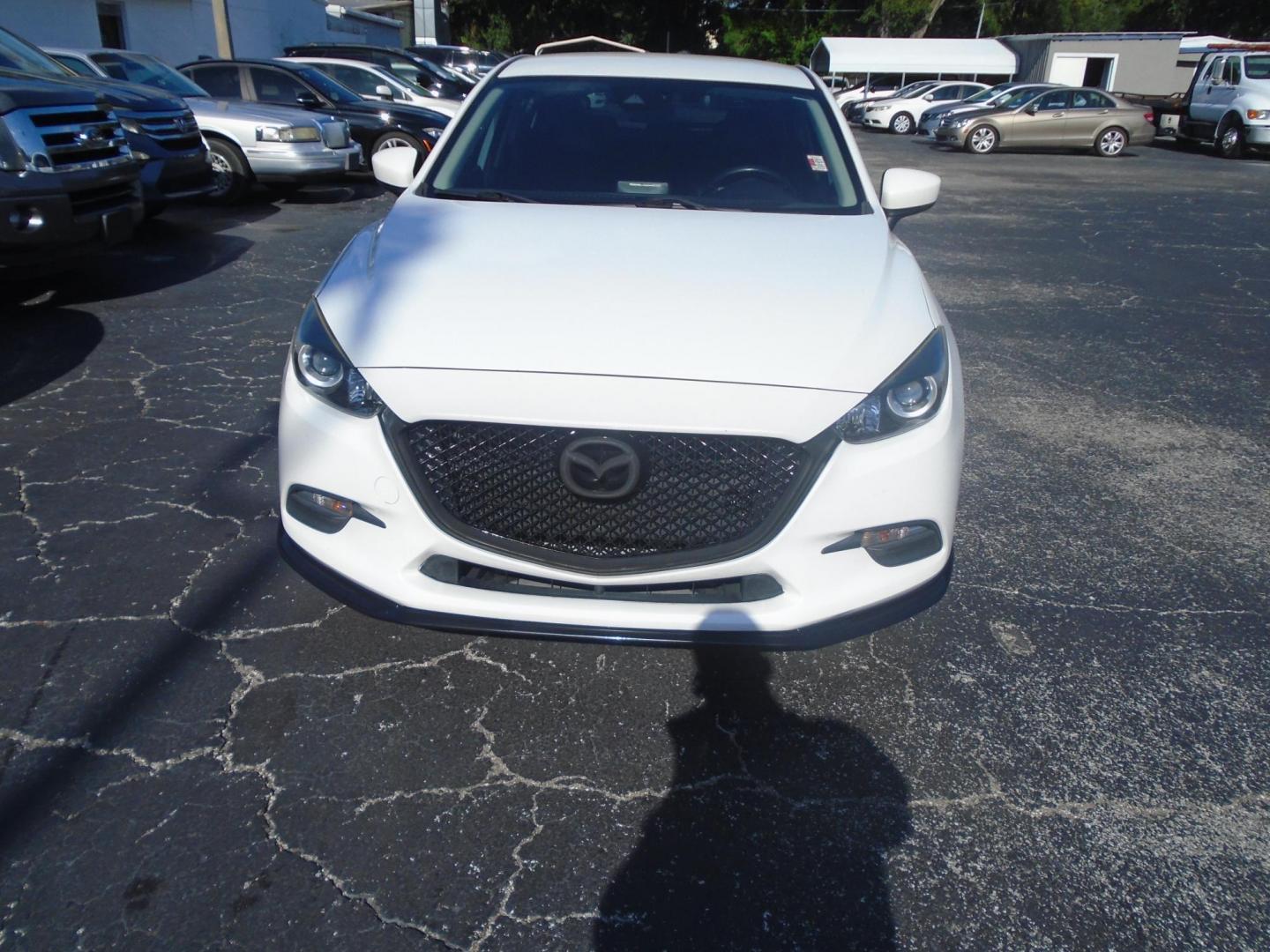 2017 White /BLACK Mazda MAZDA3 i Touring AT 5-Door (JM1BN1L77H1) with an 2.0L L4 DOHC 16V engine, 6A transmission, located at 6112 N Florida Avenue, Tampa, FL, 33604, (888) 521-5131, 27.954929, -82.459534 - 499$ down plus tax & tag. - Photo#1