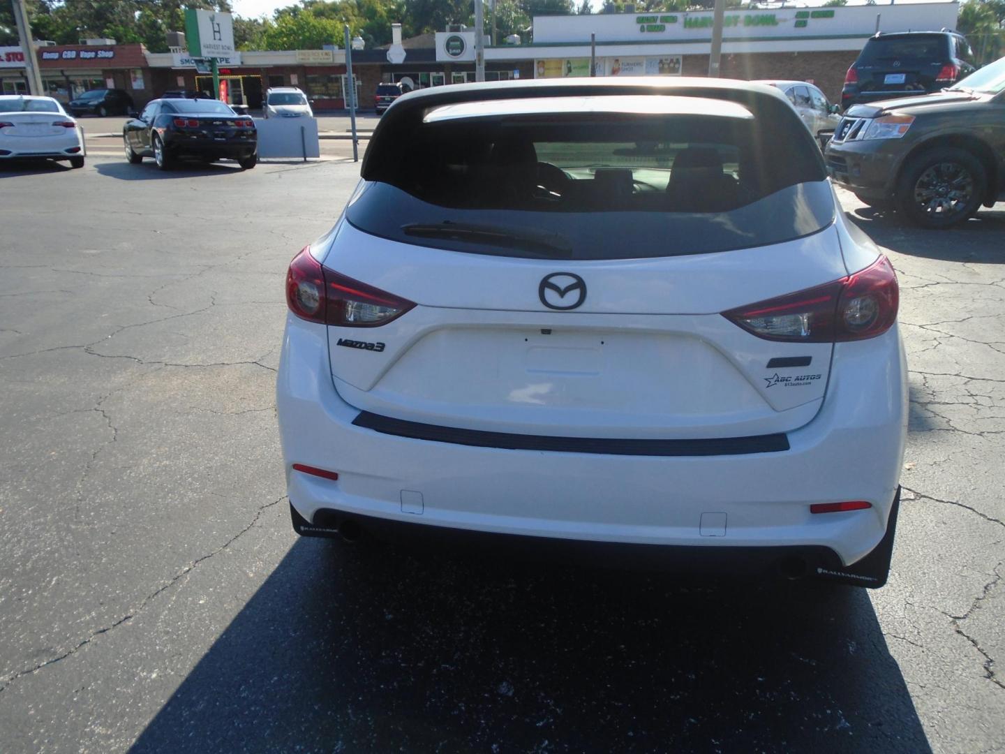 2017 White /BLACK Mazda MAZDA3 i Touring AT 5-Door (JM1BN1L77H1) with an 2.0L L4 DOHC 16V engine, 6A transmission, located at 6112 N Florida Avenue, Tampa, FL, 33604, (888) 521-5131, 27.954929, -82.459534 - 499$ down plus tax & tag. - Photo#4
