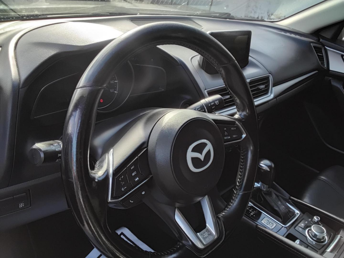 2017 White /BLACK Mazda MAZDA3 i Touring AT 5-Door (JM1BN1L77H1) with an 2.0L L4 DOHC 16V engine, 6A transmission, located at 6112 N Florida Avenue, Tampa, FL, 33604, (888) 521-5131, 27.954929, -82.459534 - 499$ down plus tax & tag. - Photo#8