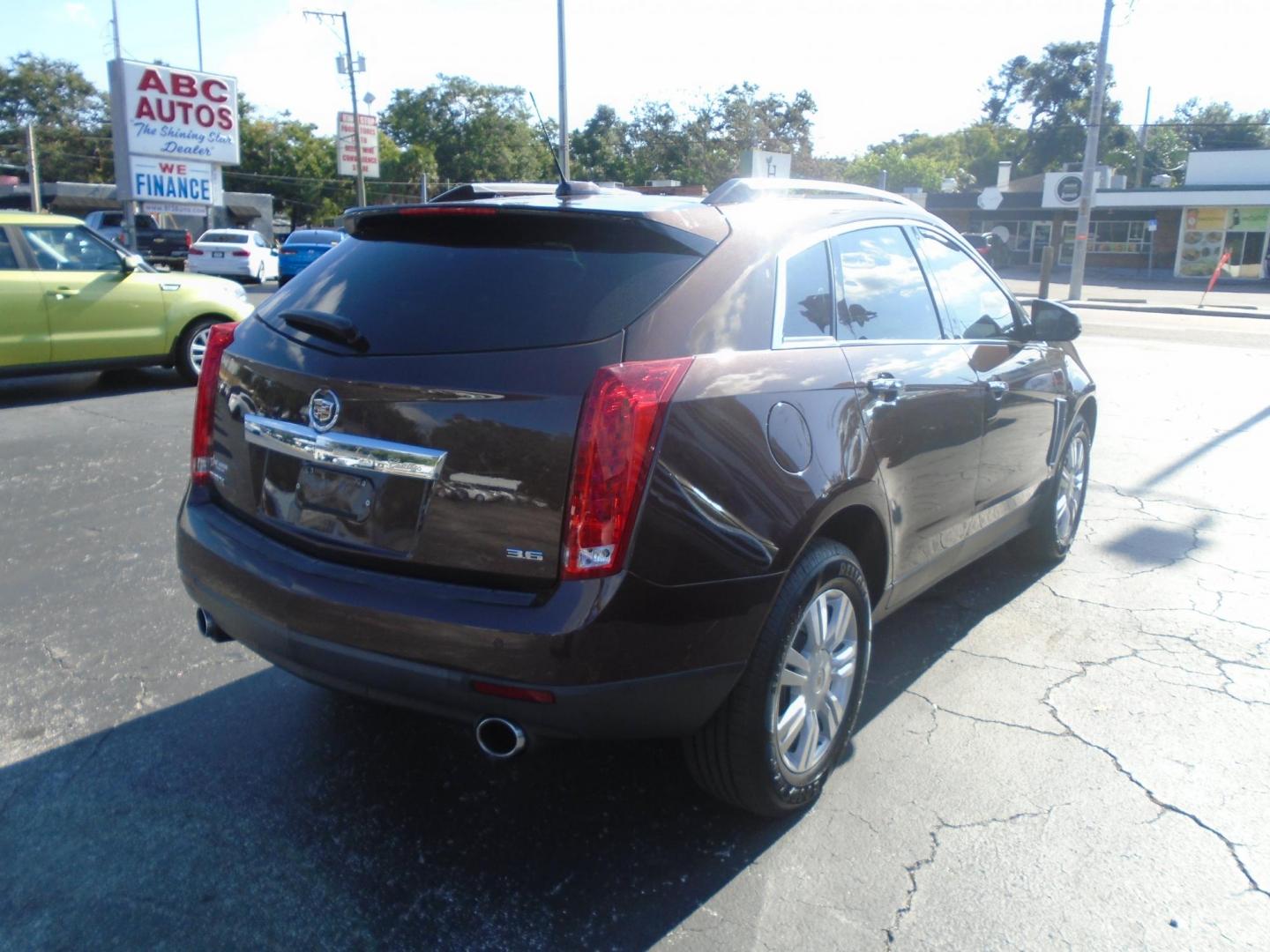 2015 BROWN /Beige Cadillac SRX Luxury Collection FWD (3GYFNBE3XFS) with an 3.6L V6 DOHC 24V FFV engine, 6-Speed Automatic transmission, located at 6112 N Florida Avenue, Tampa, FL, 33604, (888) 521-5131, 27.954929, -82.459534 - 499$ down plus tax & tag. - Photo#5