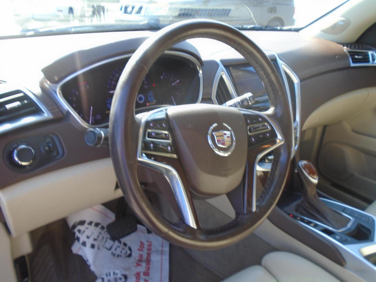 2015 BROWN /Beige Cadillac SRX Luxury Collection FWD (3GYFNBE3XFS) with an 3.6L V6 DOHC 24V FFV engine, 6-Speed Automatic transmission, located at 6112 N Florida Avenue, Tampa, FL, 33604, (888) 521-5131, 27.954929, -82.459534 - 499$ down plus tax & tag. - Photo#9